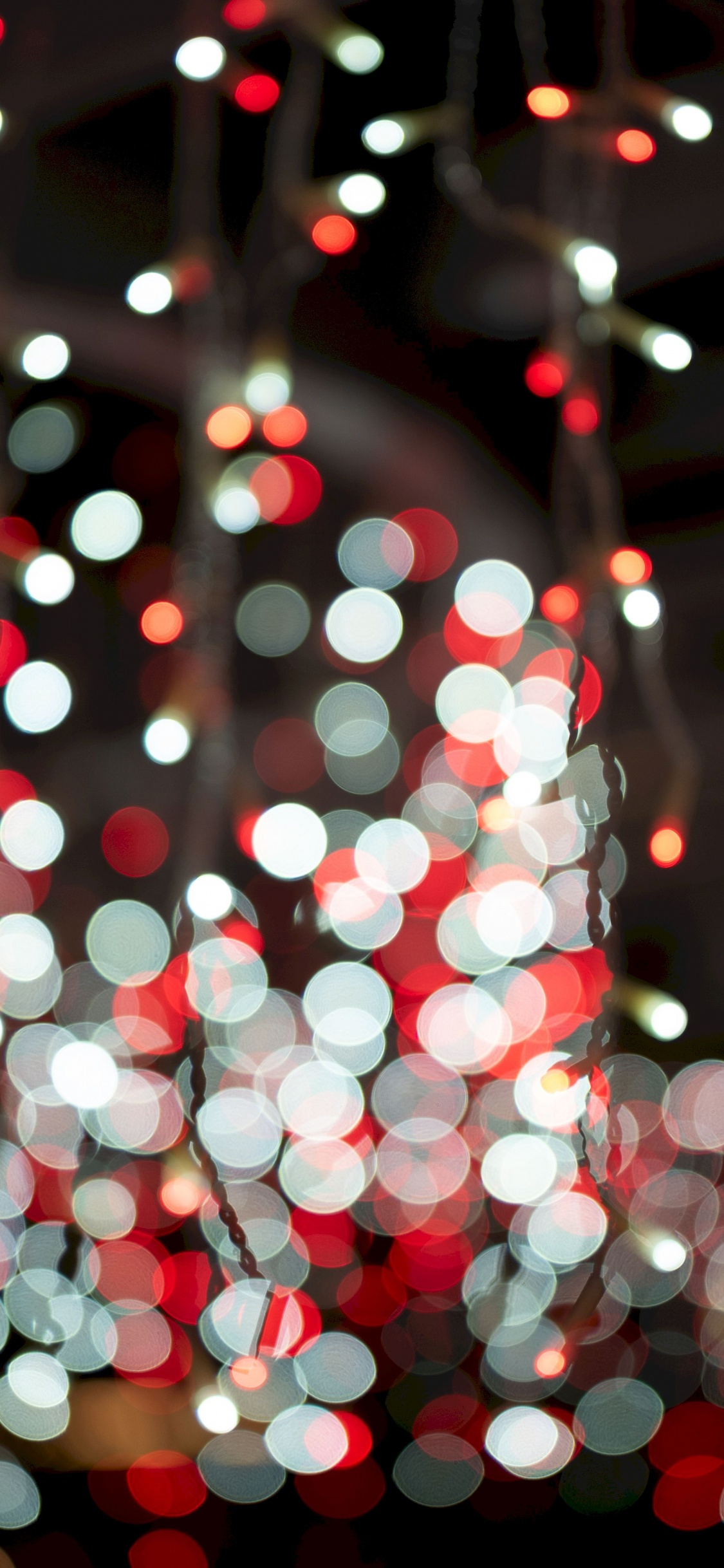 Red and White String Lights. Wallpaper in 1125x2436 Resolution