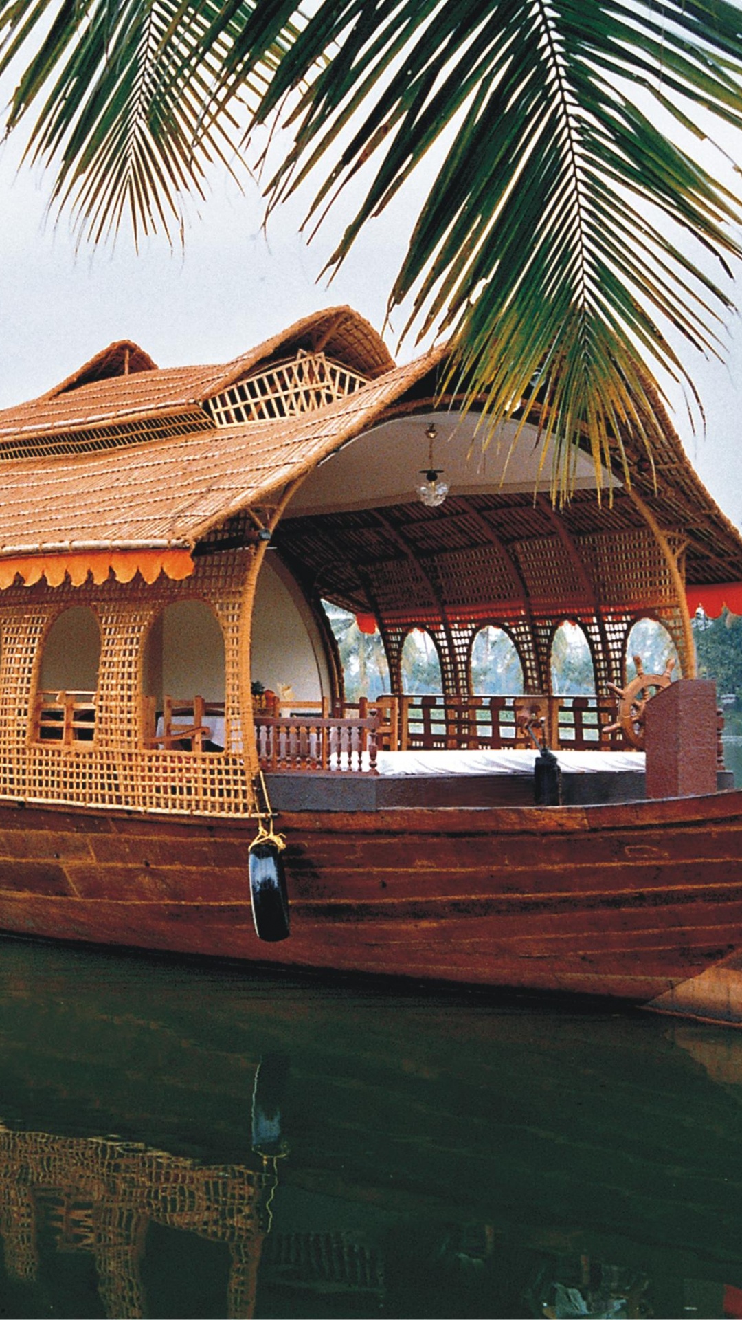 Brown Wooden Boat on Water. Wallpaper in 1080x1920 Resolution