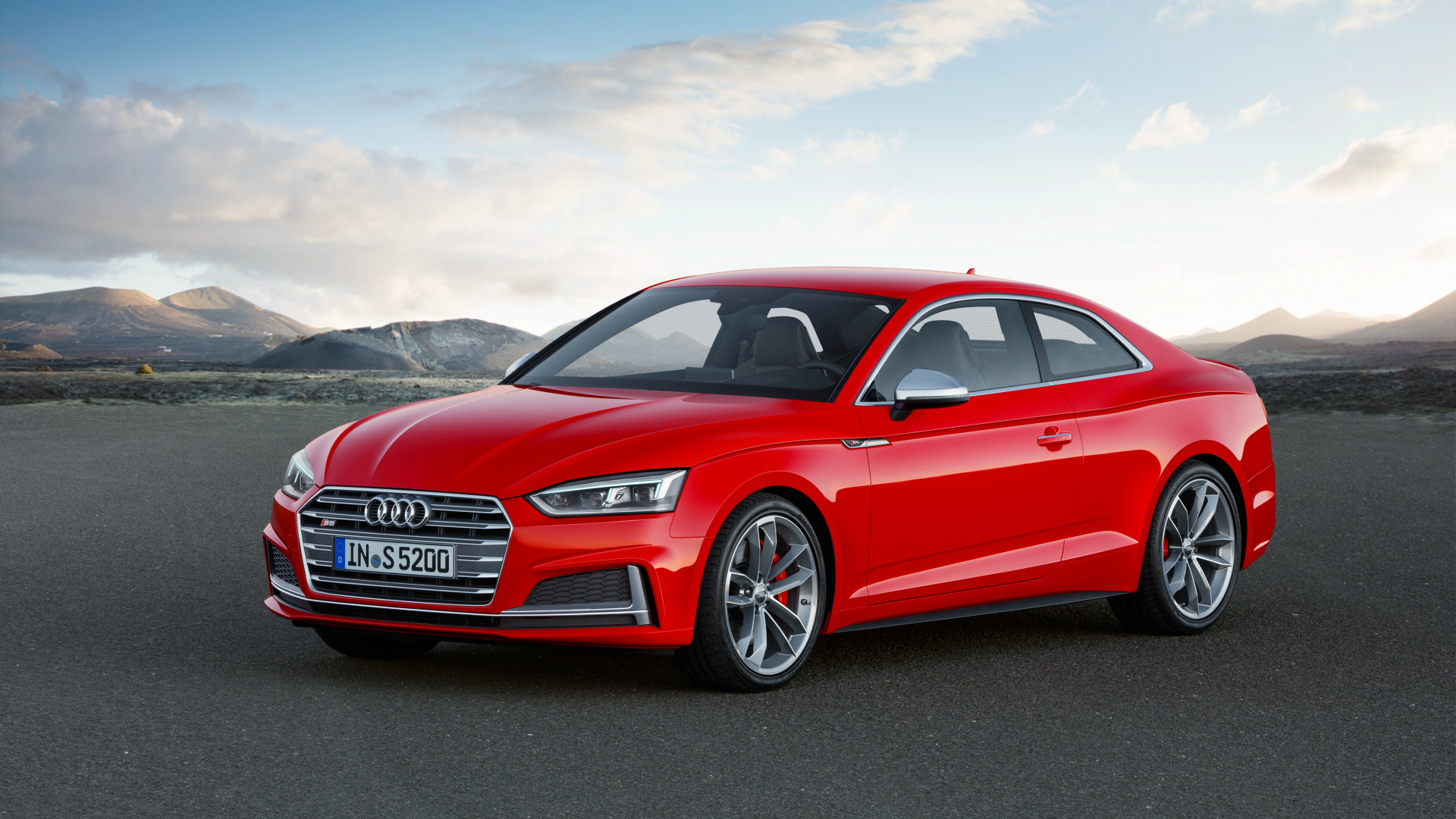 Red Audi a 4 Sedan on a Gray Asphalt Road. Wallpaper in 1920x1080 Resolution