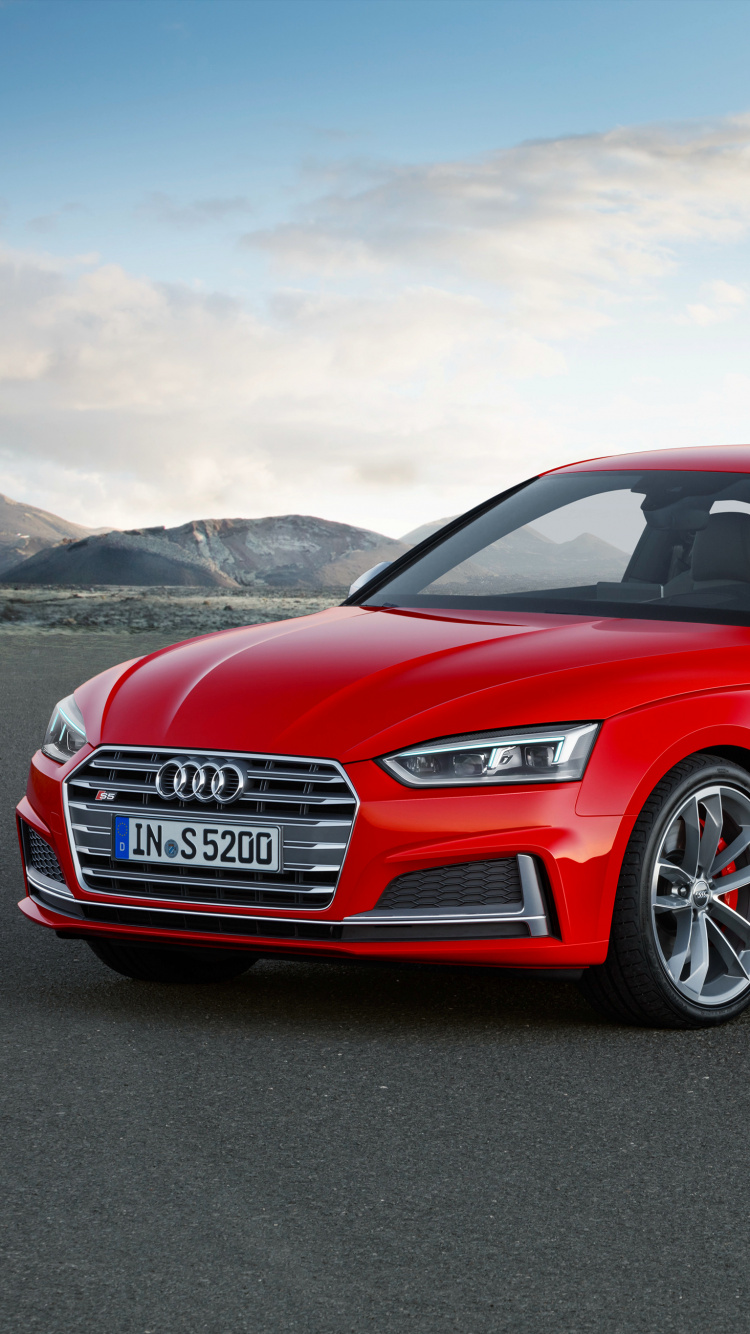 Red Audi a 4 Sedan on a Gray Asphalt Road. Wallpaper in 750x1334 Resolution