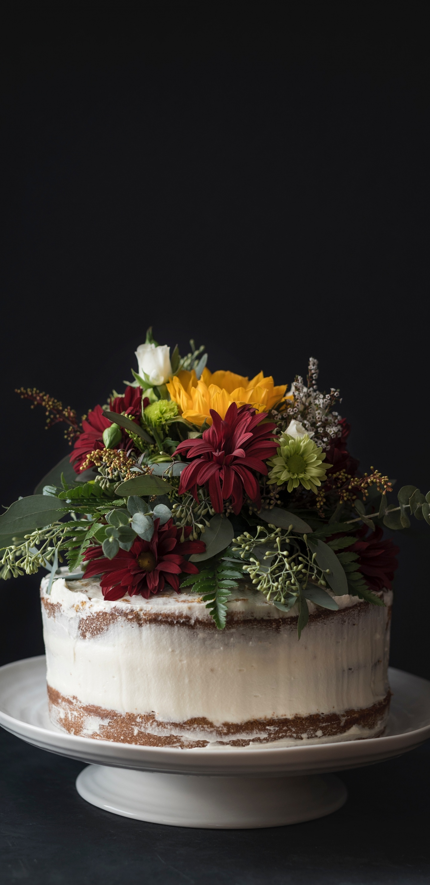 Yellow and Red Flowers on White Ceramic Vase. Wallpaper in 1440x2960 Resolution