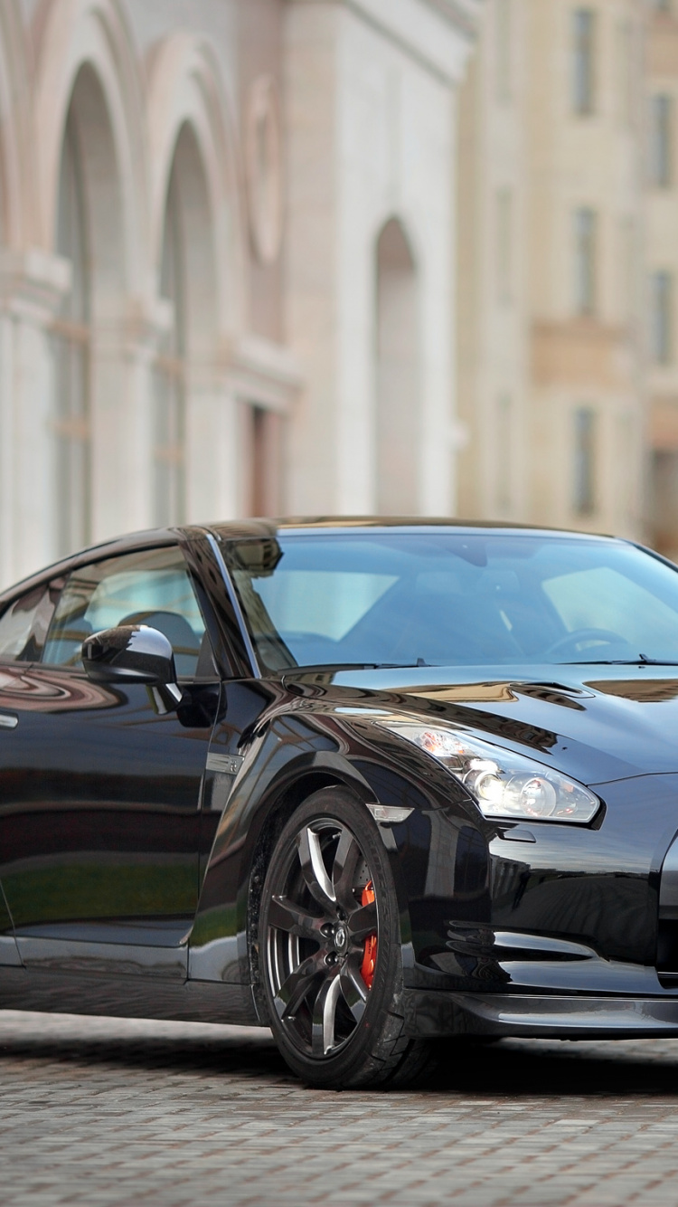 Blue Porsche 911 Parked on Street During Daytime. Wallpaper in 750x1334 Resolution