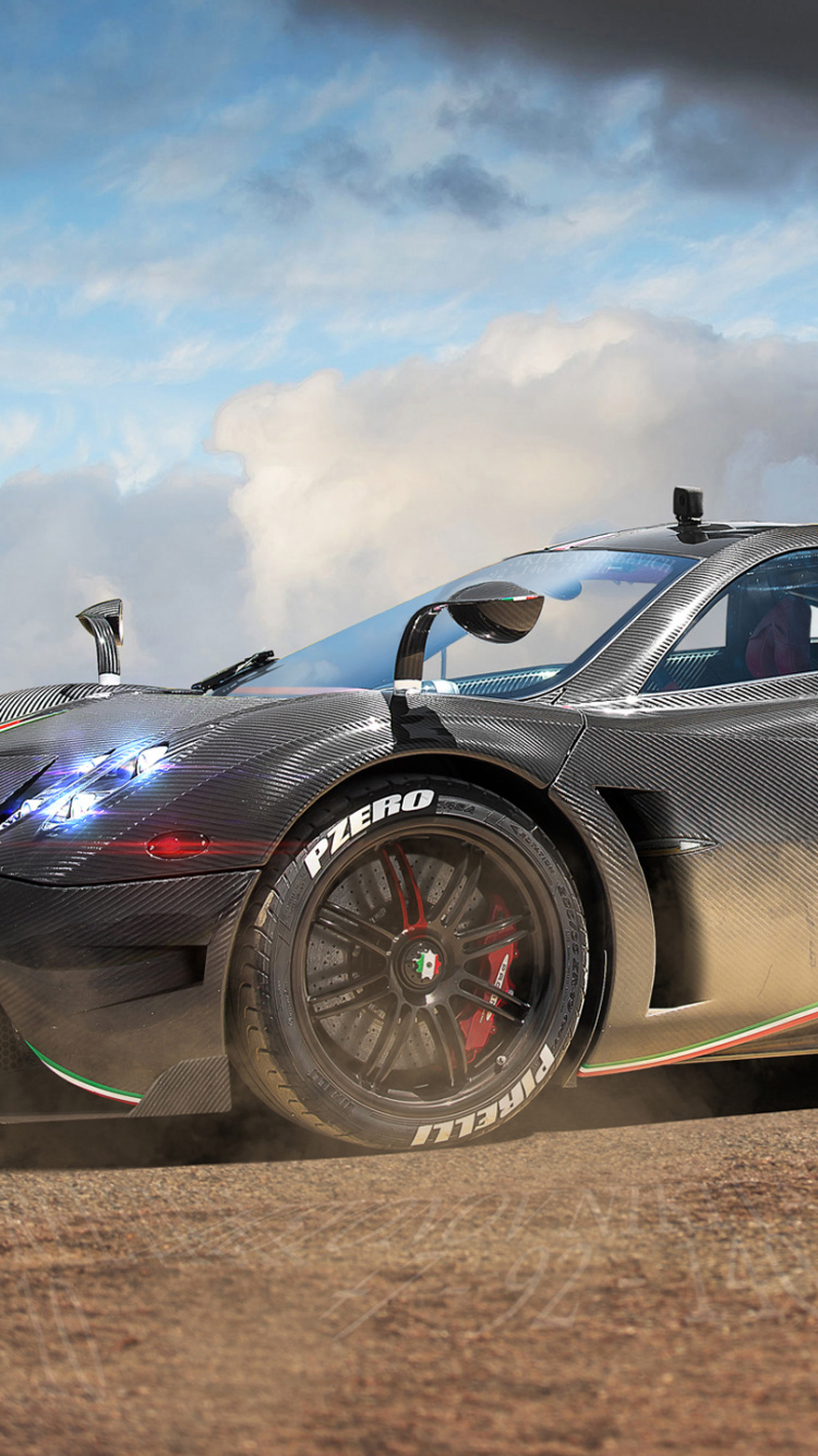 Porsche 911 Negro Sobre Marrón Camino de Tierra Bajo Nubes Grises. Wallpaper in 750x1334 Resolution