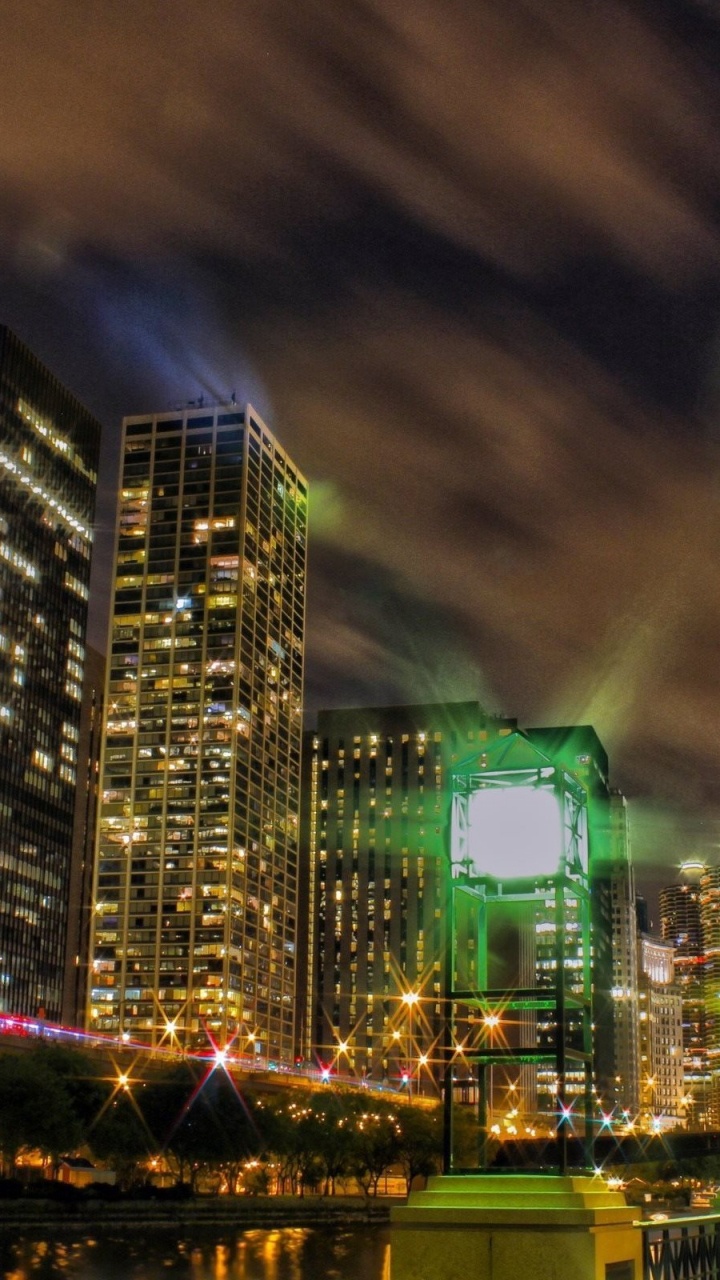 City Buildings During Night Time. Wallpaper in 720x1280 Resolution