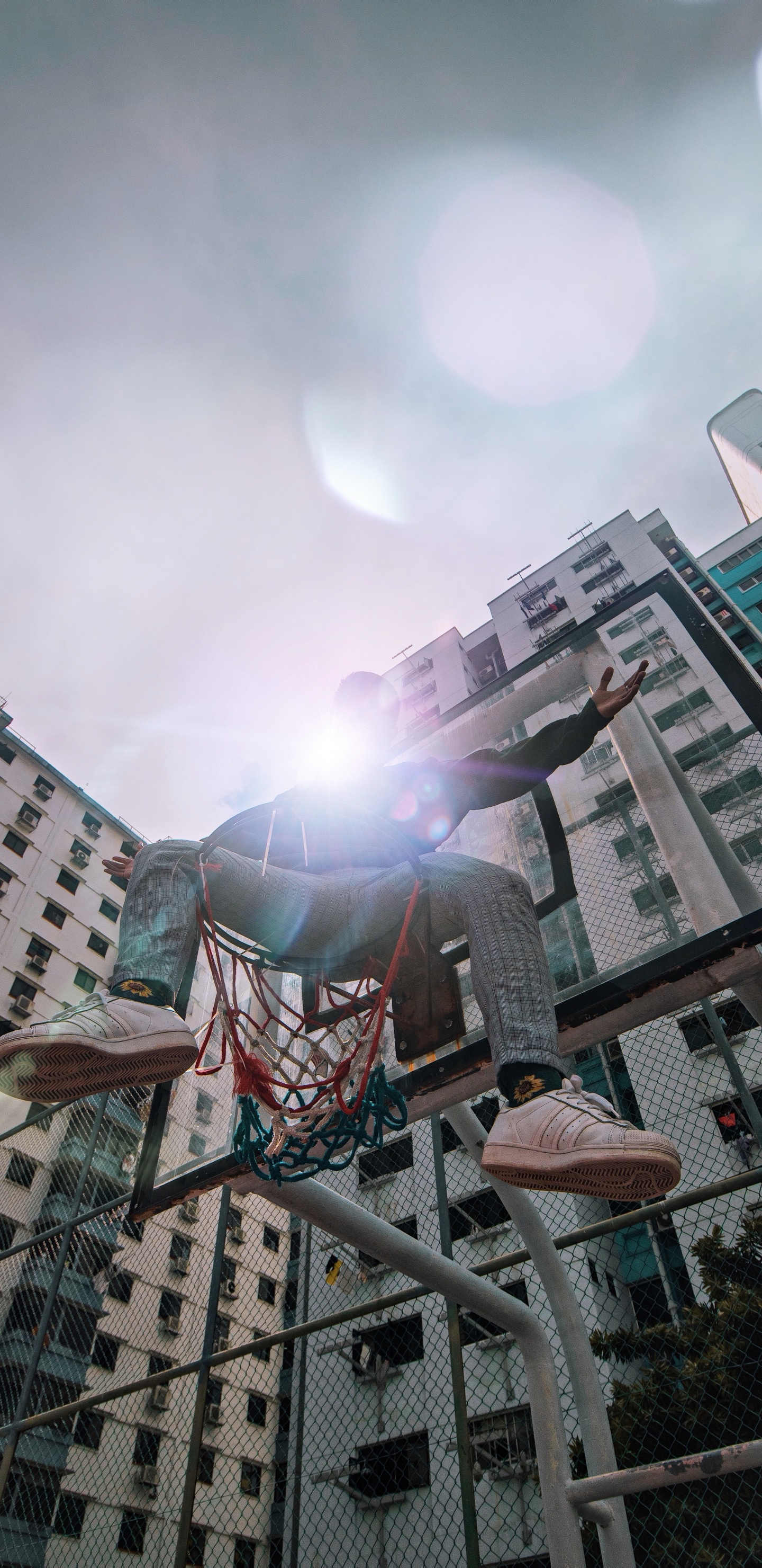 Woman in Black and Red Dress Standing on Brown Wooden Ladder During Daytime. Wallpaper in 1440x2960 Resolution