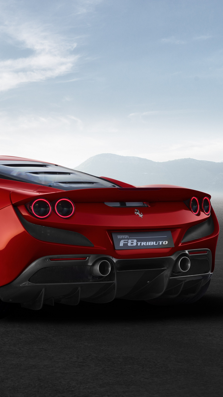 Red Porsche 911 on Black Asphalt Road Under White Clouds During Daytime. Wallpaper in 750x1334 Resolution