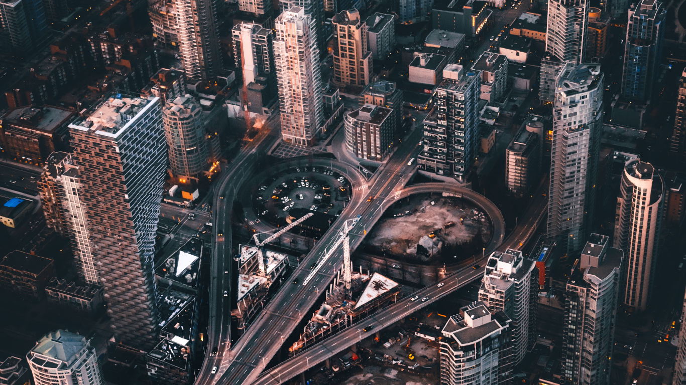 Aerial View of City Buildings During Night Time. Wallpaper in 1366x768 Resolution