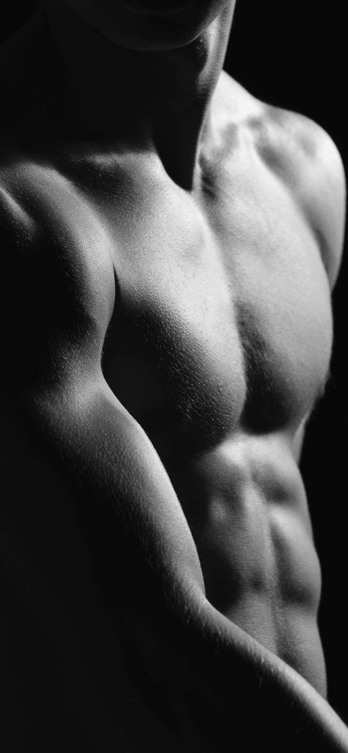 Homme Seins Nus en Short Noir. Wallpaper in 1125x2436 Resolution