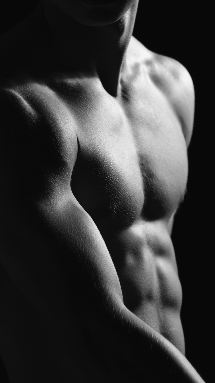 Homme Seins Nus en Short Noir. Wallpaper in 750x1334 Resolution