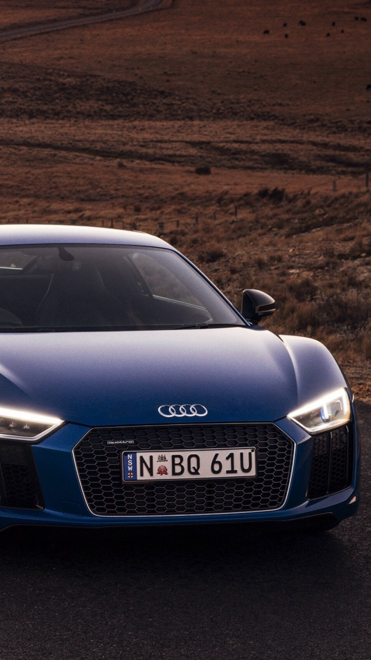 Blauer Audi r 8 Tagsüber Unterwegs. Wallpaper in 750x1334 Resolution