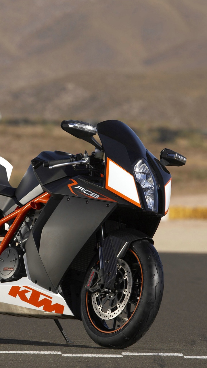 Black and Orange Sports Bike on Road During Daytime. Wallpaper in 720x1280 Resolution