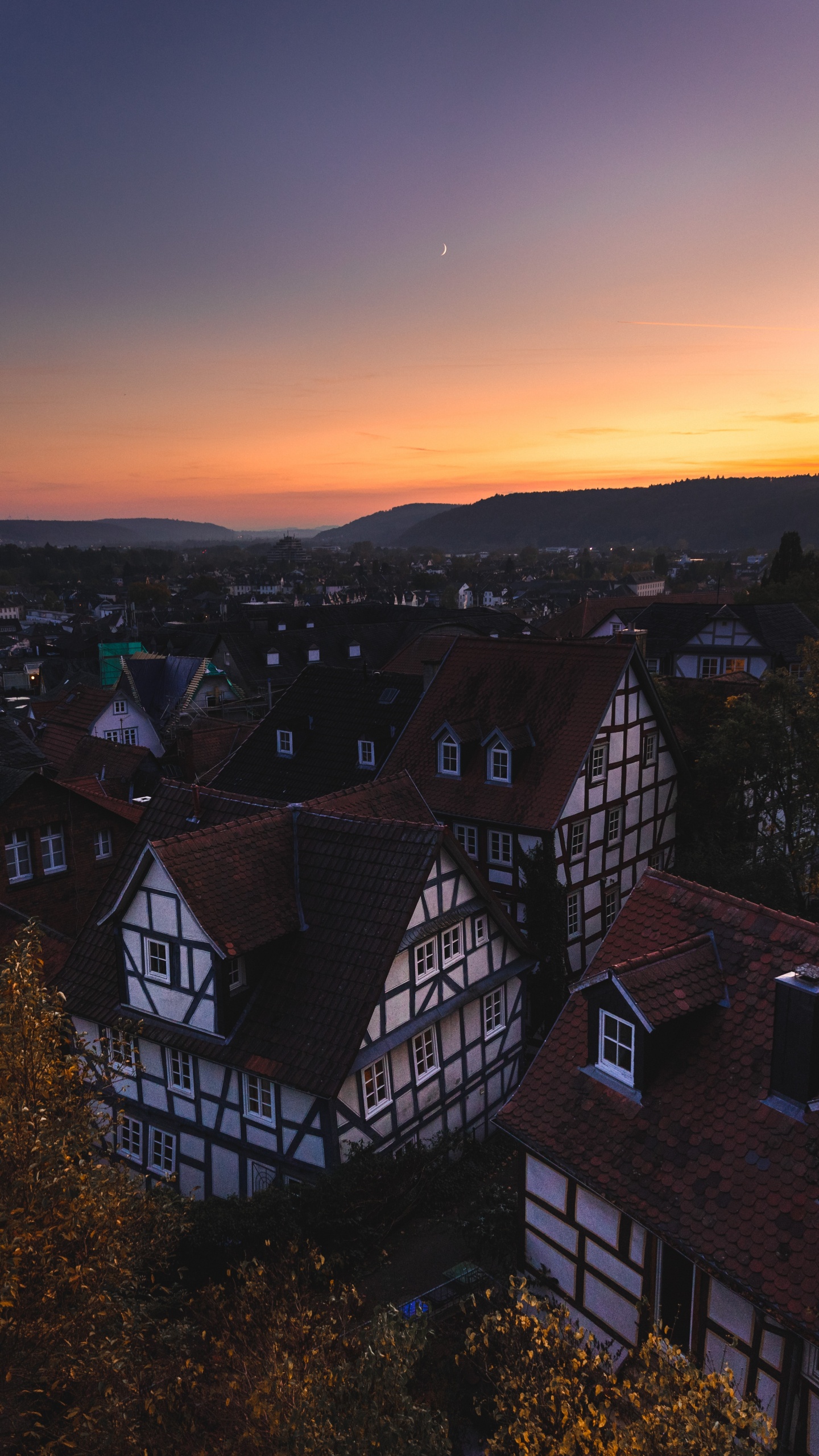 Aerial View of City During Sunset. Wallpaper in 1440x2560 Resolution