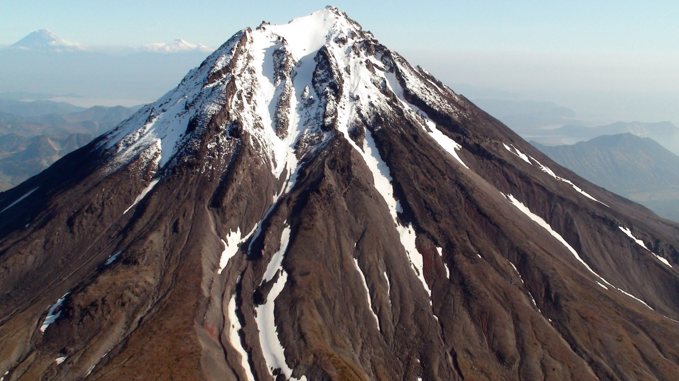 Brown and White Mountain Under Blue Sky During Daytime. Wallpaper in 1366x768 Resolution