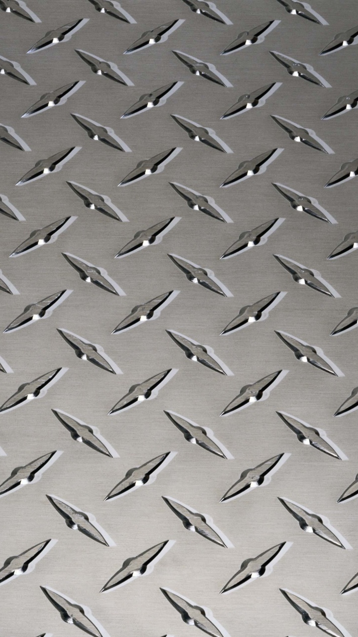 Graues Und Schwarzes Leder Textil. Wallpaper in 720x1280 Resolution