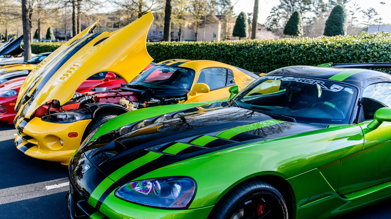 Green and Black Lamborghini Aventador Parked on Gray Concrete Pavement During Daytime. Wallpaper in 1366x768 Resolution