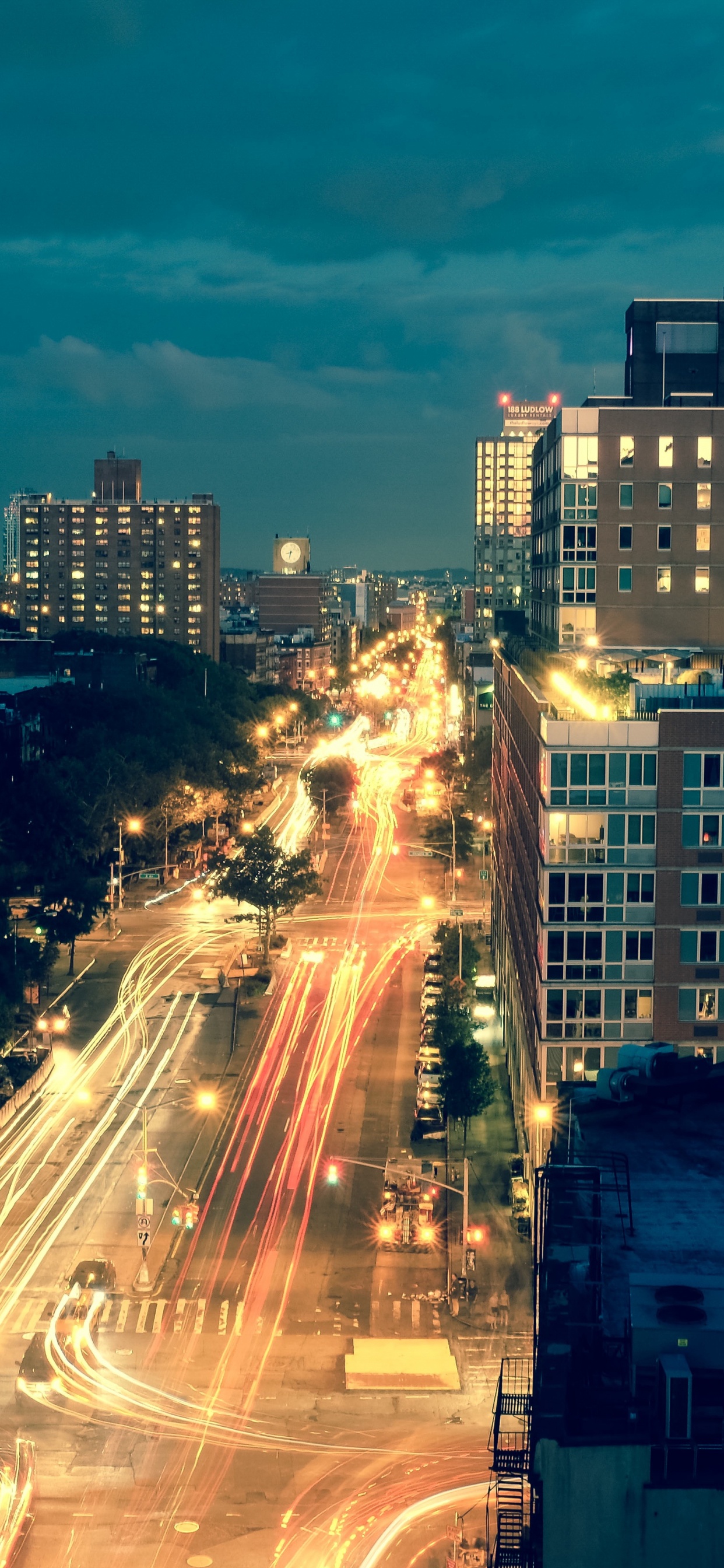 Time Lapse Photography of Cars on Road During Night Time. Wallpaper in 1242x2688 Resolution