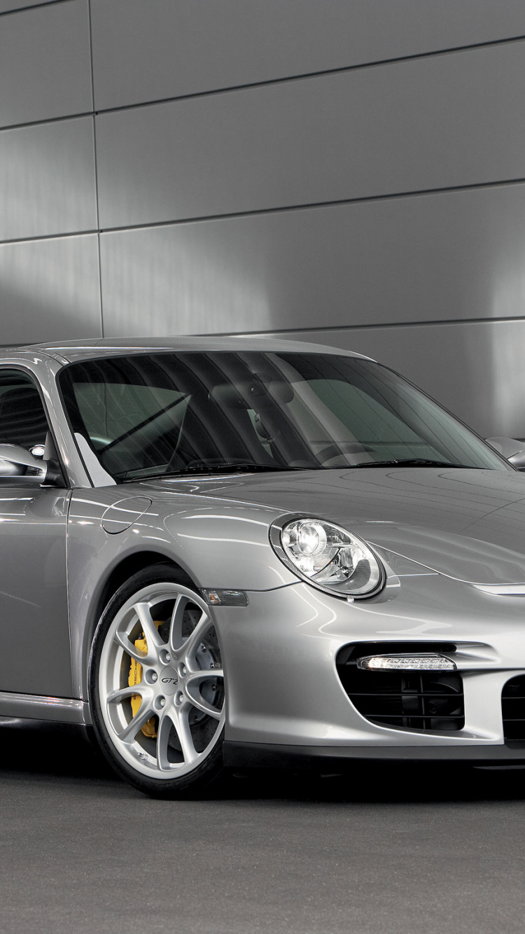 Gray Mercedes Benz Coupe Parked in a Garage. Wallpaper in 750x1334 Resolution