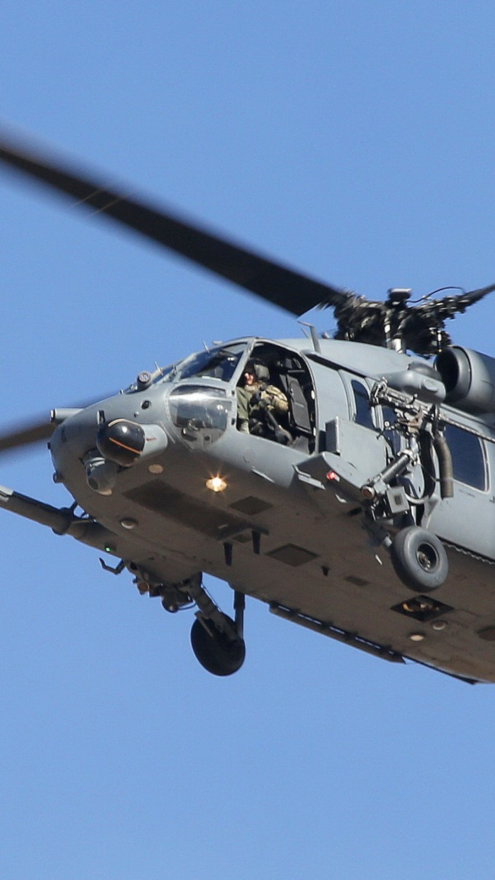 Avion de Chasse Gris et Noir Dans le Ciel. Wallpaper in 720x1280 Resolution