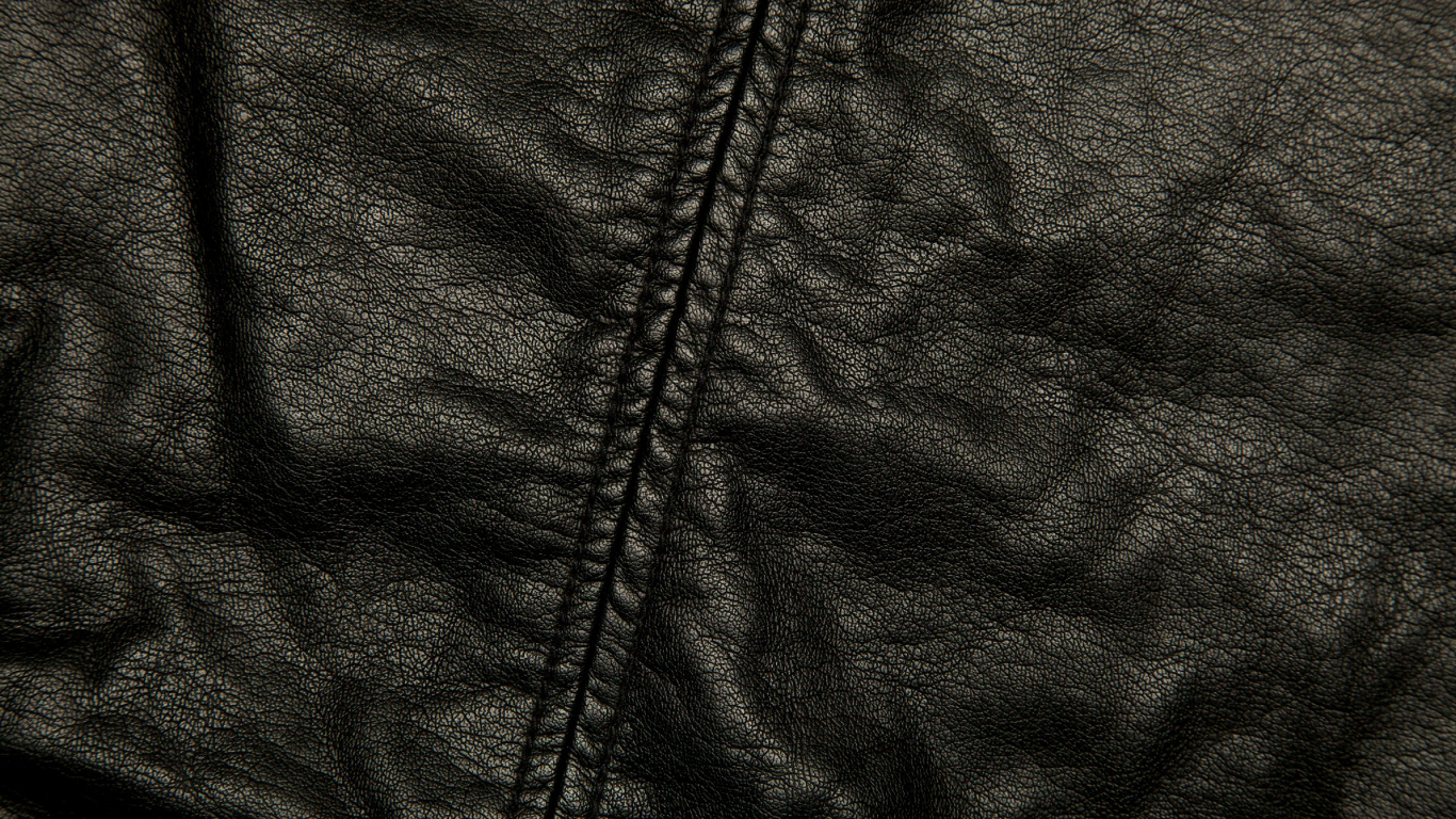 Veste Zippée Noire Sur Textile Blanc. Wallpaper in 1366x768 Resolution