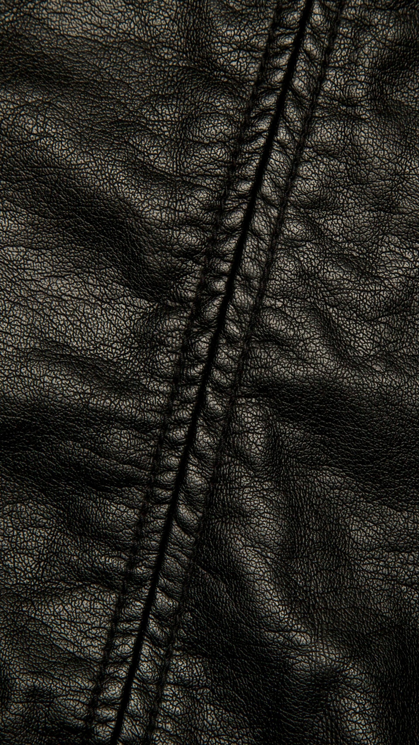 Veste Zippée Noire Sur Textile Blanc. Wallpaper in 1440x2560 Resolution