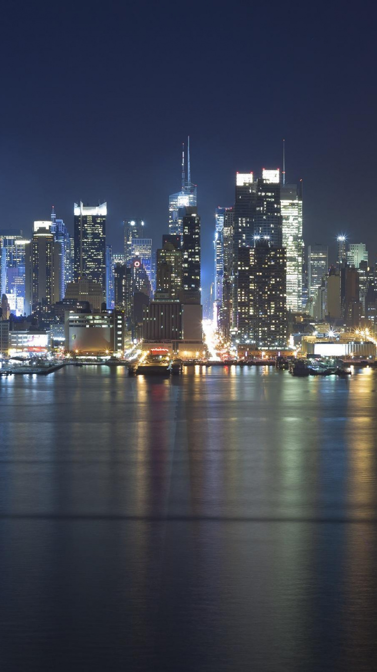 City Skyline During Night Time. Wallpaper in 750x1334 Resolution
