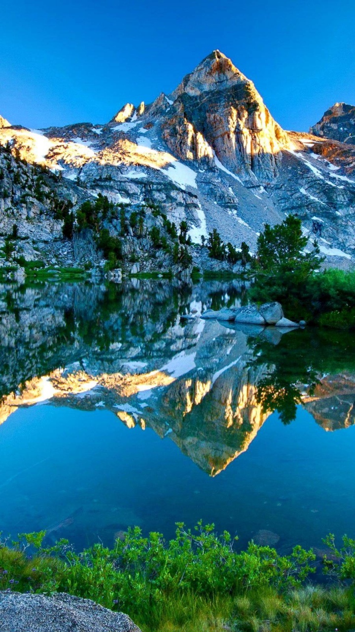 Snow Covered Mountain Near Lake During Daytime. Wallpaper in 720x1280 Resolution