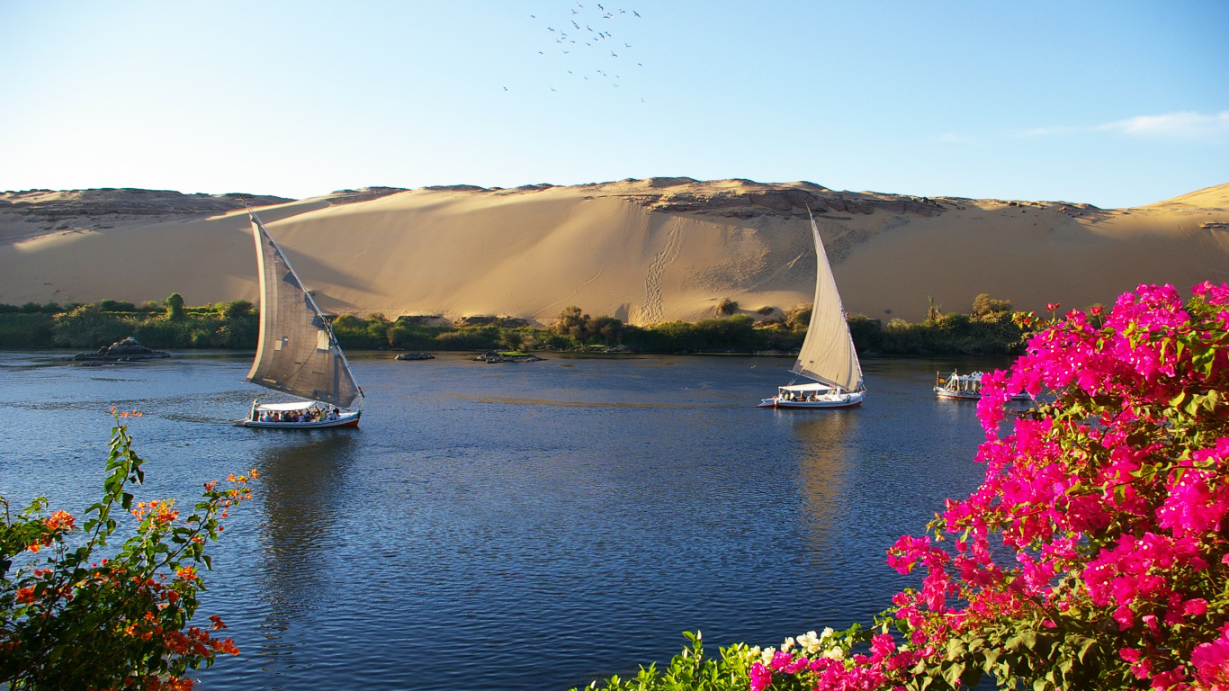 Sailboat on Water Near Mountain During Daytime. Wallpaper in 1366x768 Resolution