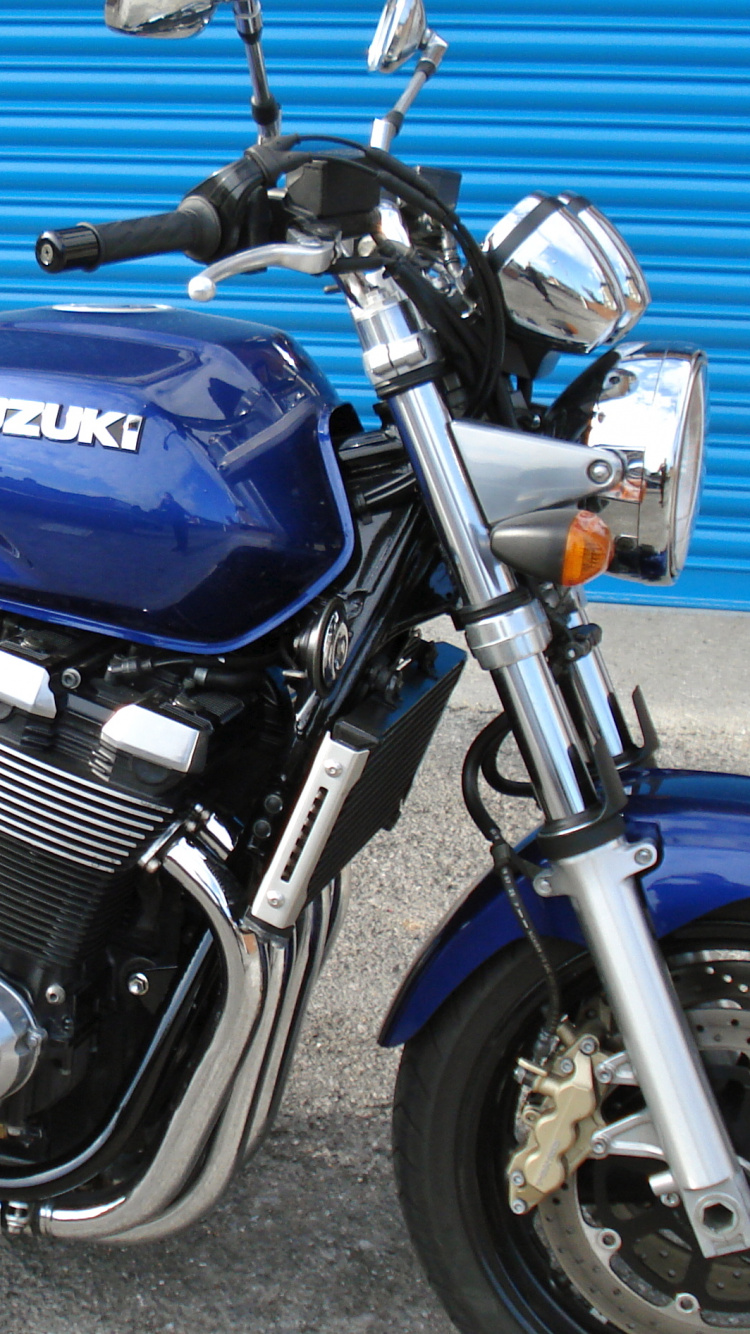 Moto Honda Bleu et Noir. Wallpaper in 750x1334 Resolution