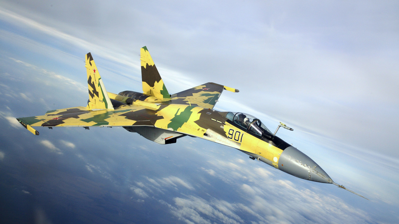 Yellow and Black Fighter Jet Flying in The Sky. Wallpaper in 1366x768 Resolution