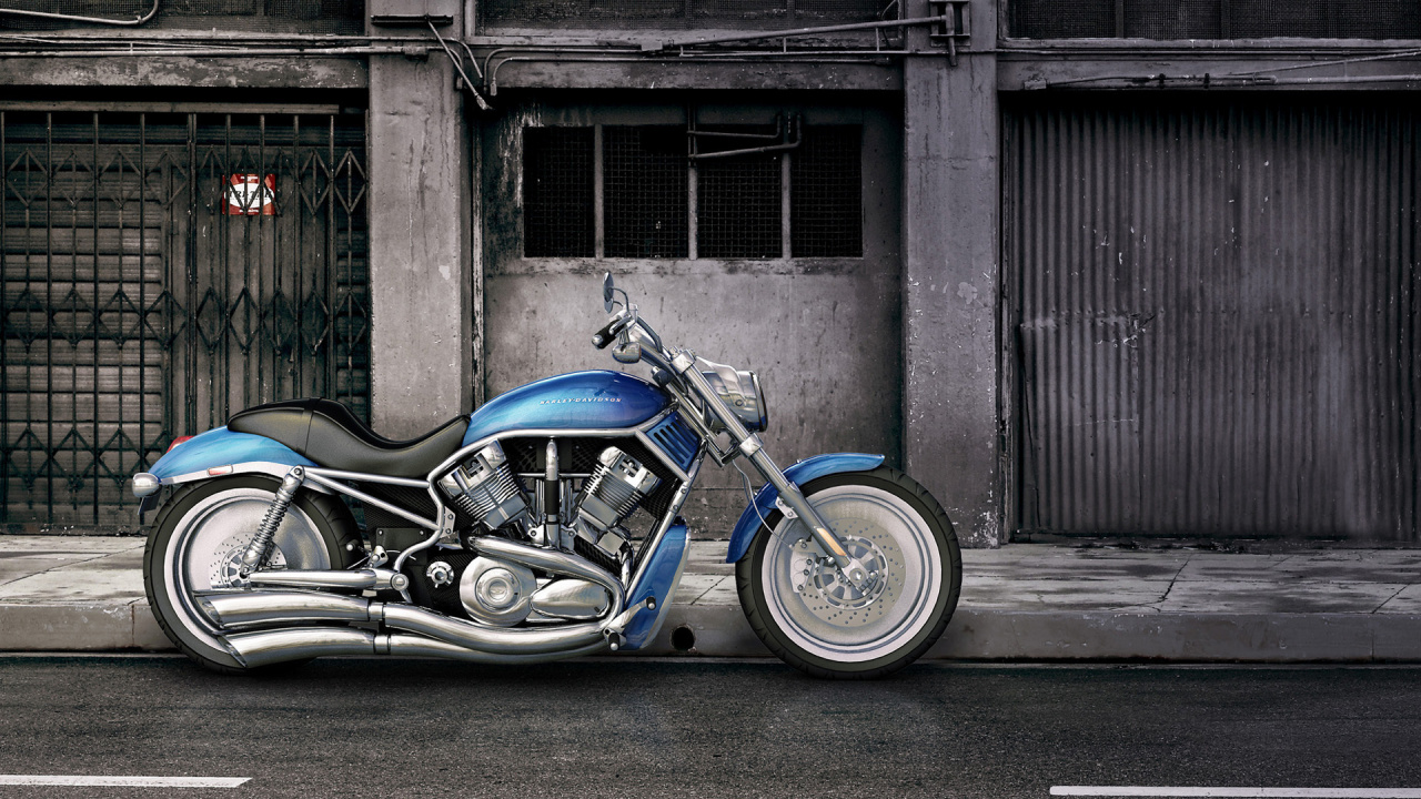Blue and Black Motorcycle Parked Beside Brown Concrete Building. Wallpaper in 1280x720 Resolution