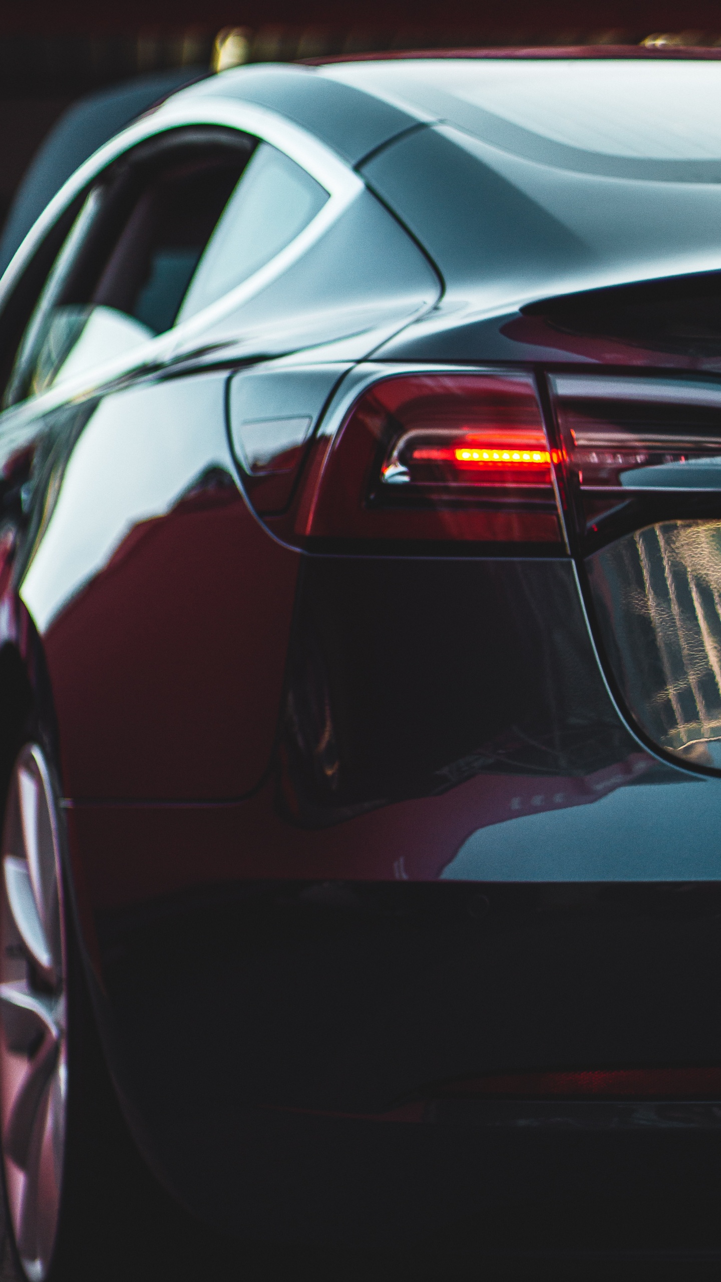 Red Car With White Light. Wallpaper in 1440x2560 Resolution