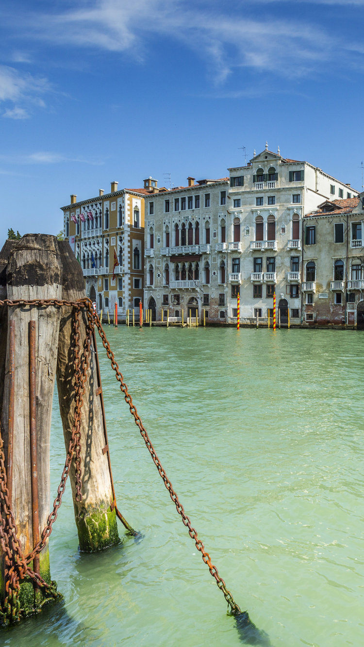 Body of Water Near Buildings During Daytime. Wallpaper in 750x1334 Resolution