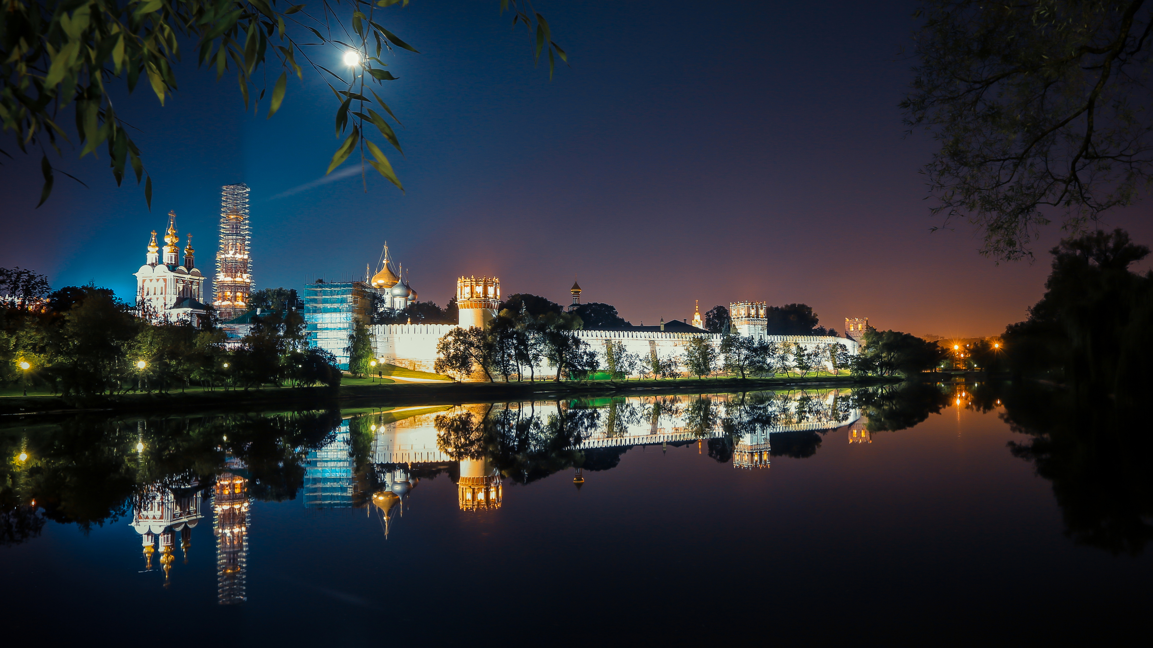 Body of Water Near City Buildings During Night Time. Wallpaper in 3840x2160 Resolution