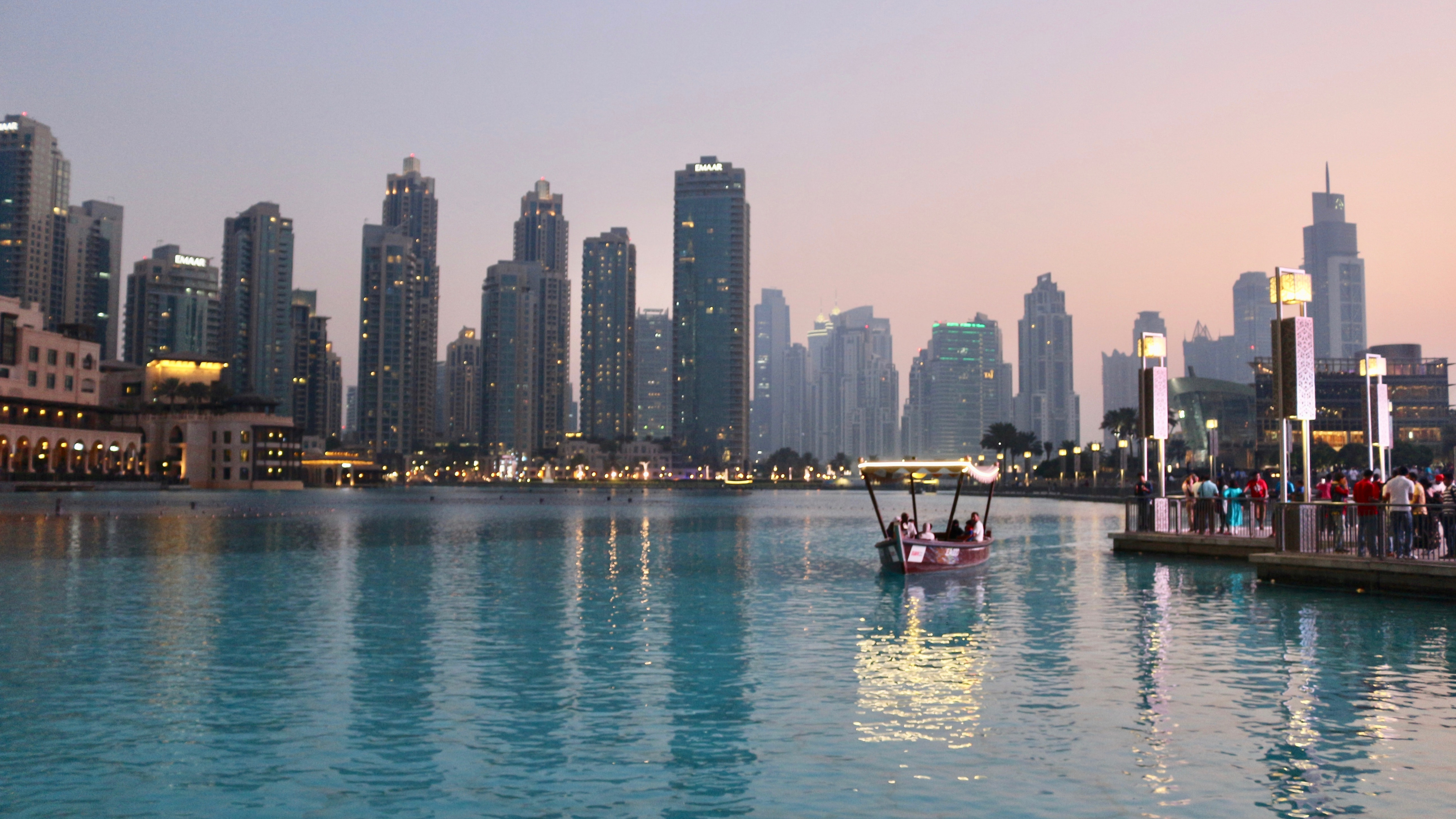 Red Boat on Body of Water Near City Buildings During Daytime. Wallpaper in 3840x2160 Resolution