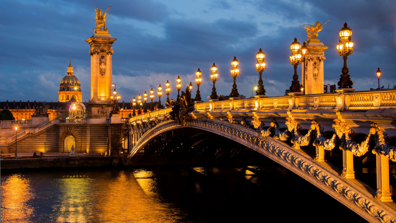 People Walking on Bridge During Night Time. Wallpaper in 1366x768 Resolution