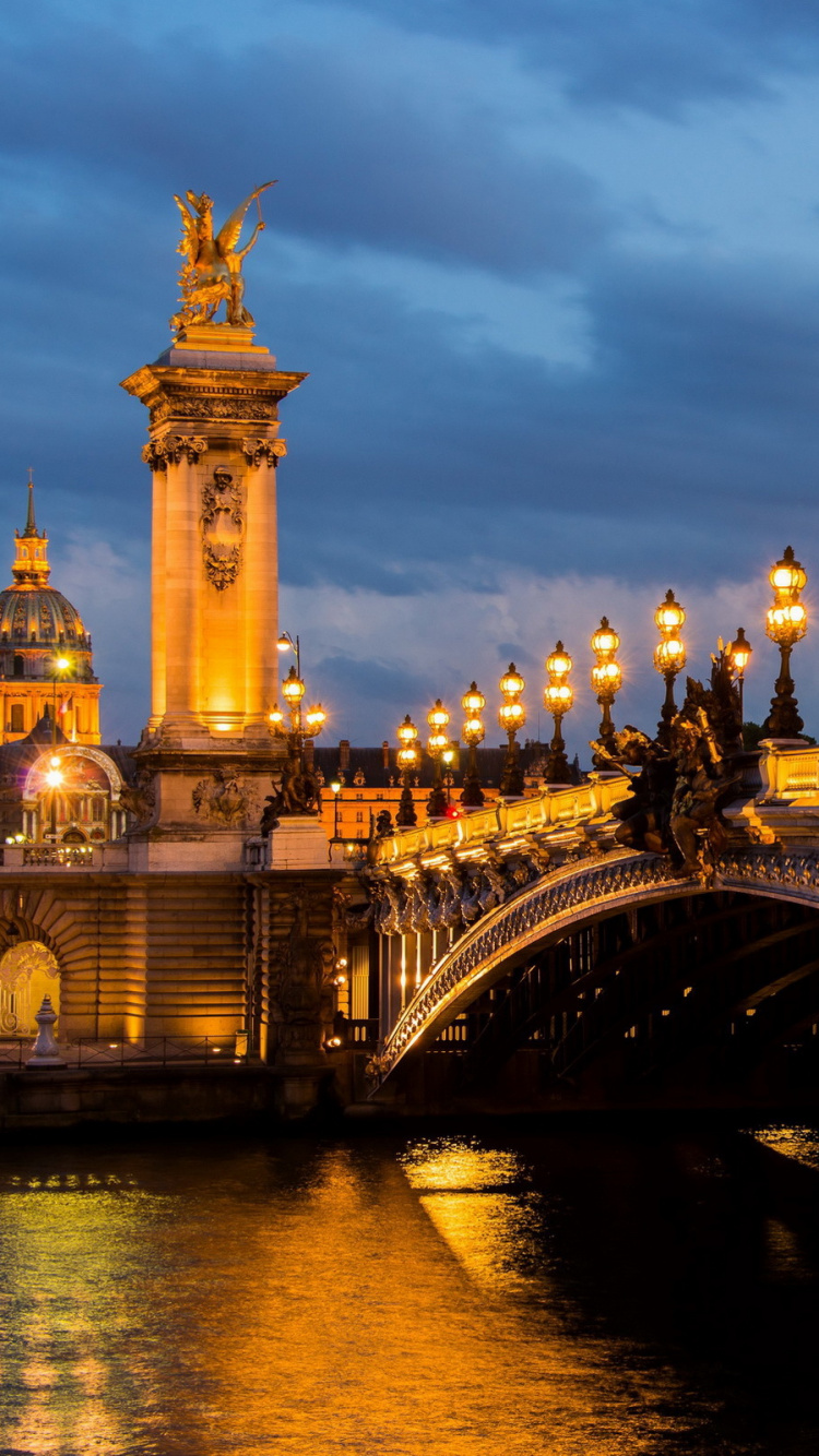 People Walking on Bridge During Night Time. Wallpaper in 750x1334 Resolution