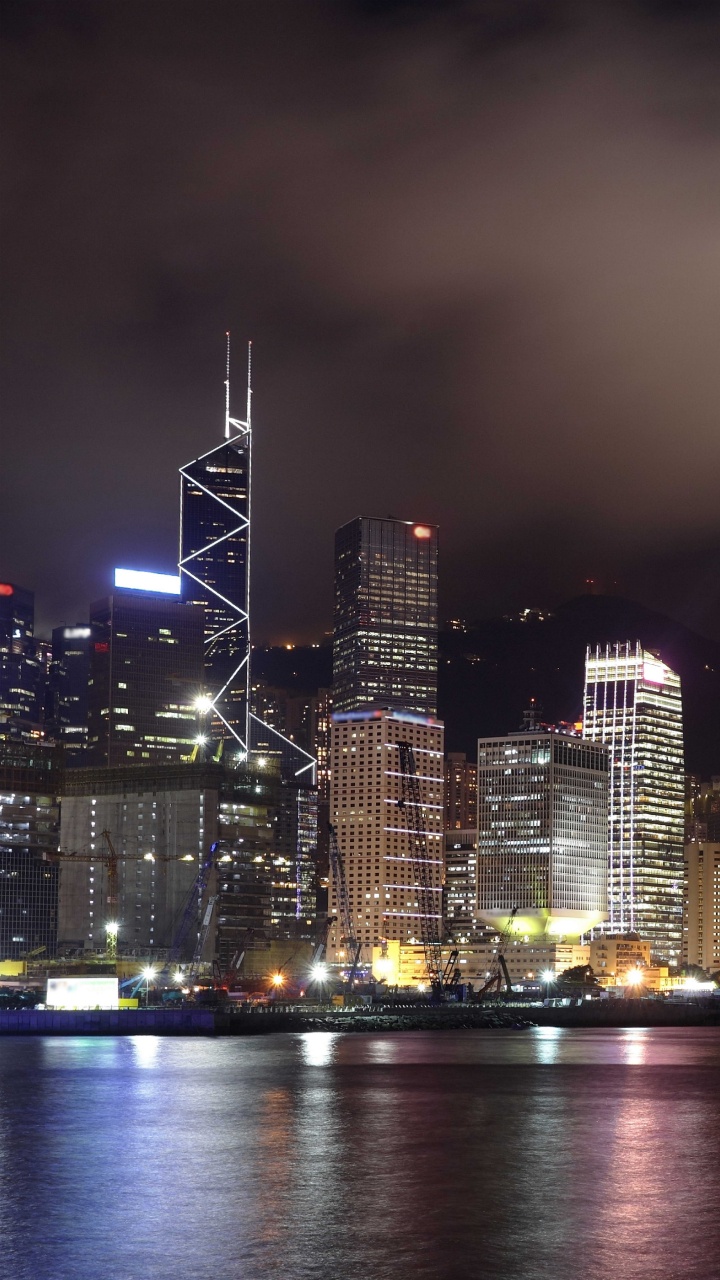 City Skyline During Night Time. Wallpaper in 720x1280 Resolution