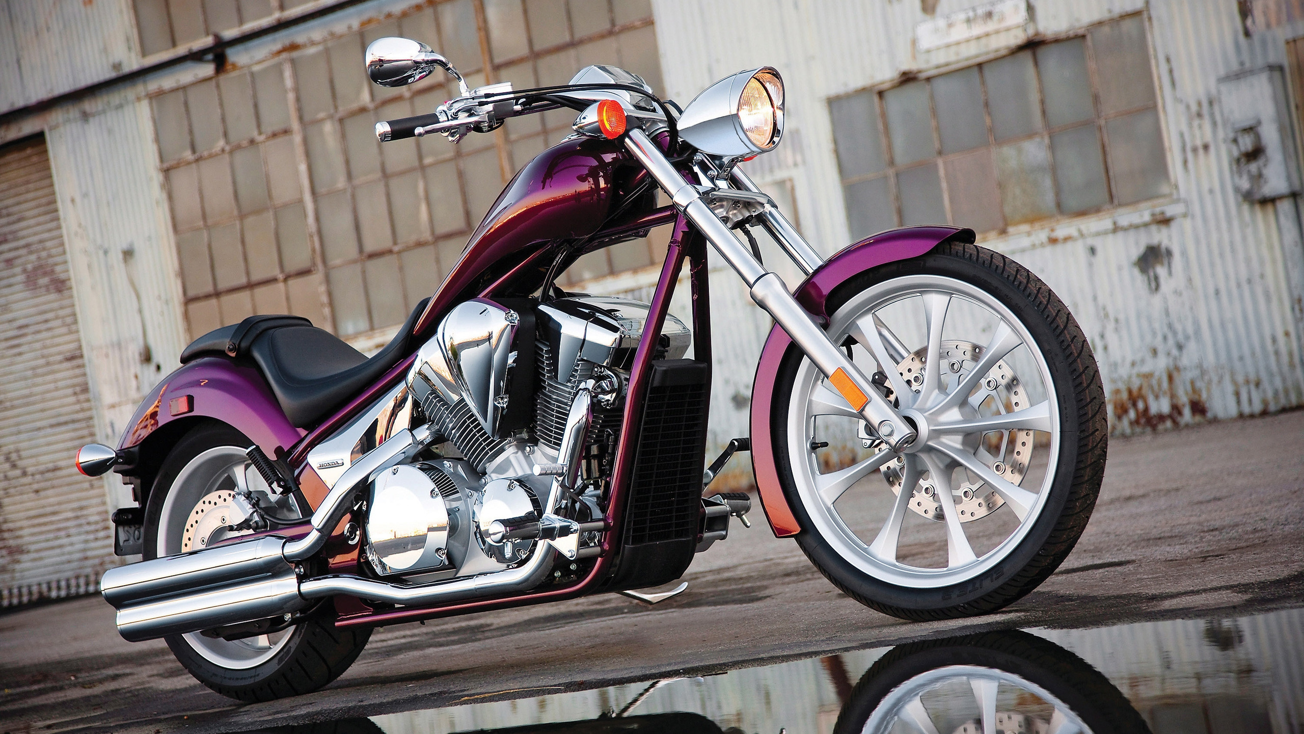 Black and Red Motorcycle Parked Beside Brown Wooden Fence. Wallpaper in 2560x1440 Resolution