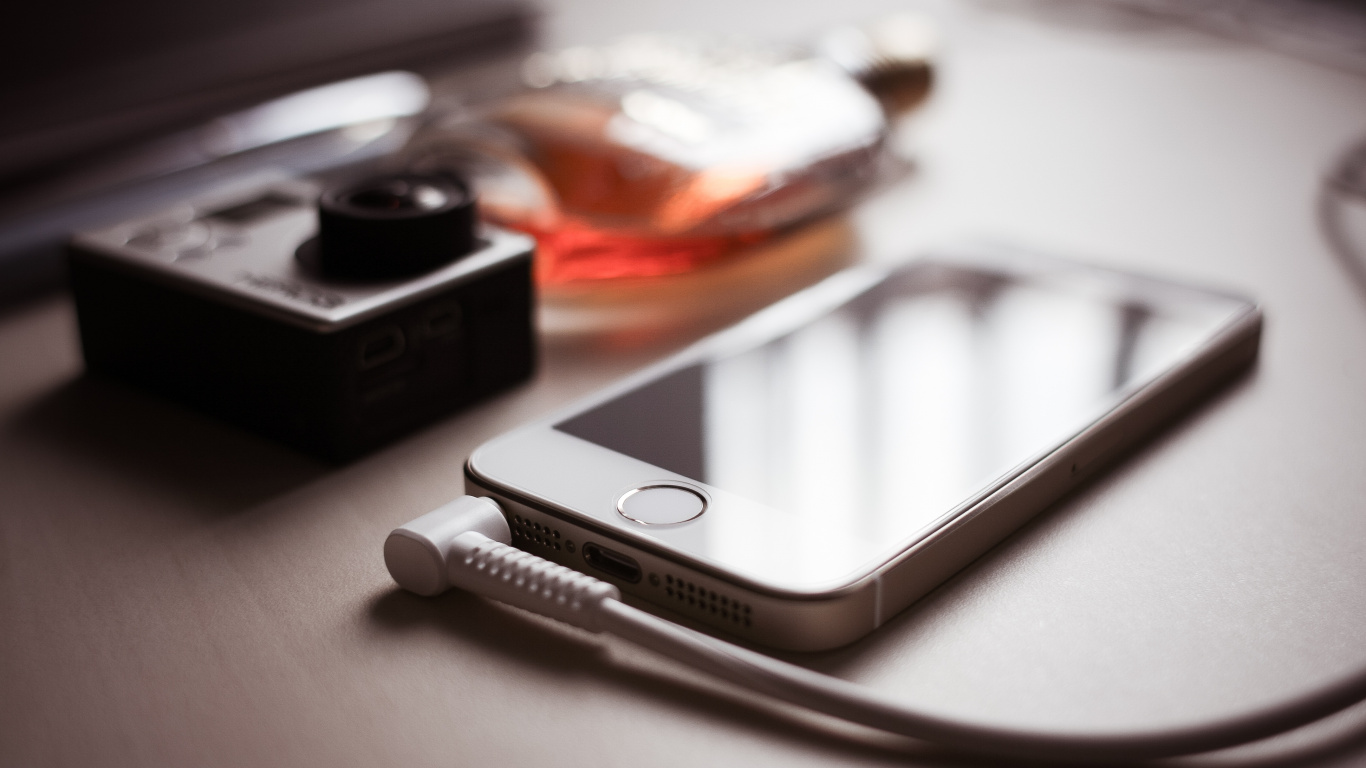 White Usb Cable on White Surface. Wallpaper in 1366x768 Resolution