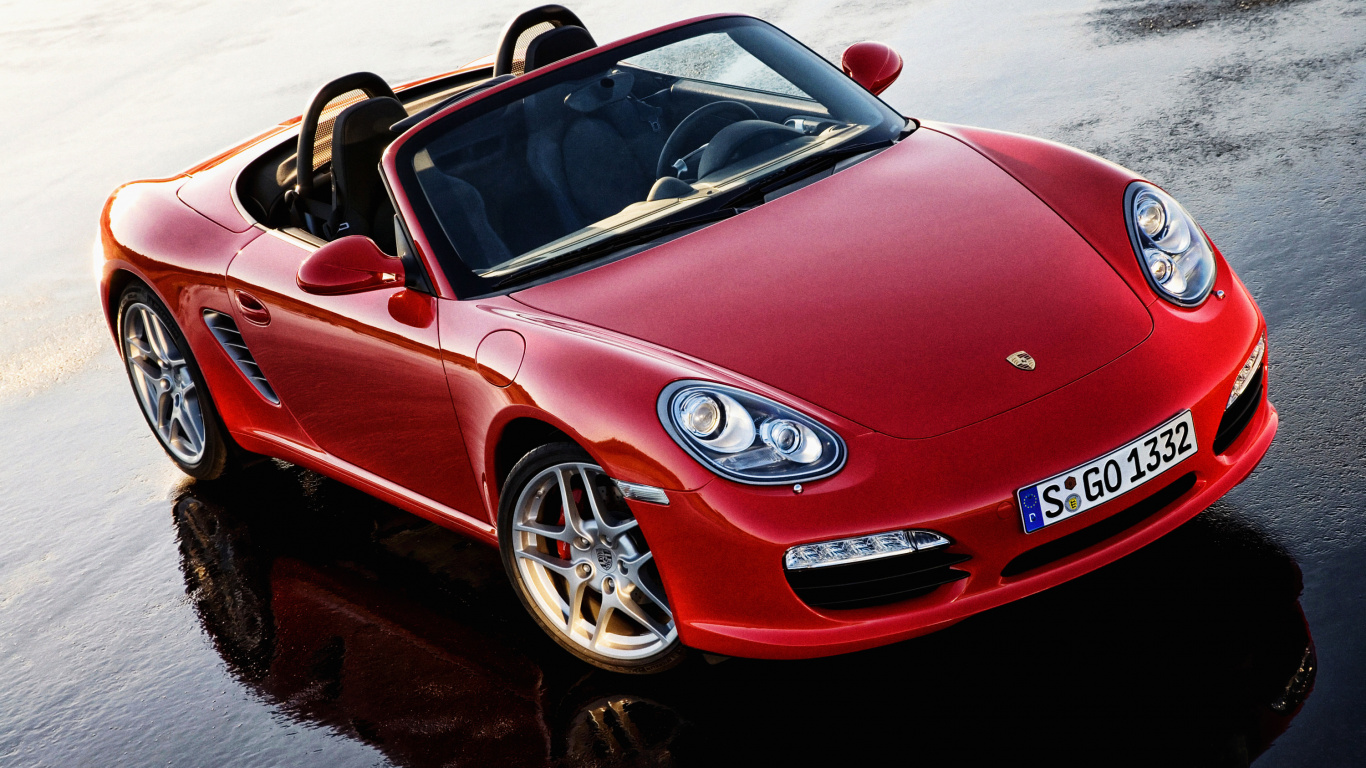 Red Ferrari 458 Italia on Snow Covered Ground. Wallpaper in 1366x768 Resolution