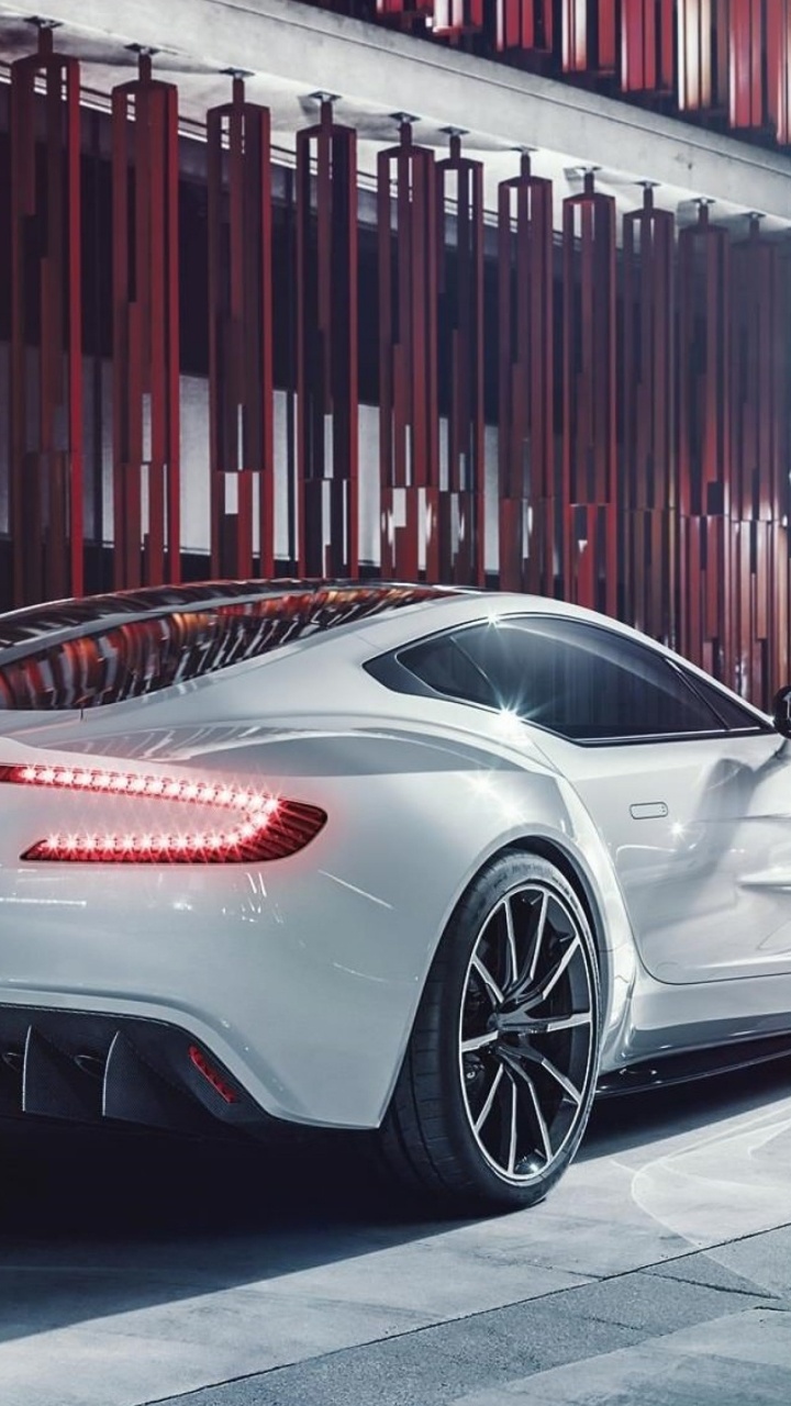 White Porsche 911 Parked in Front of Red and White Wall. Wallpaper in 720x1280 Resolution