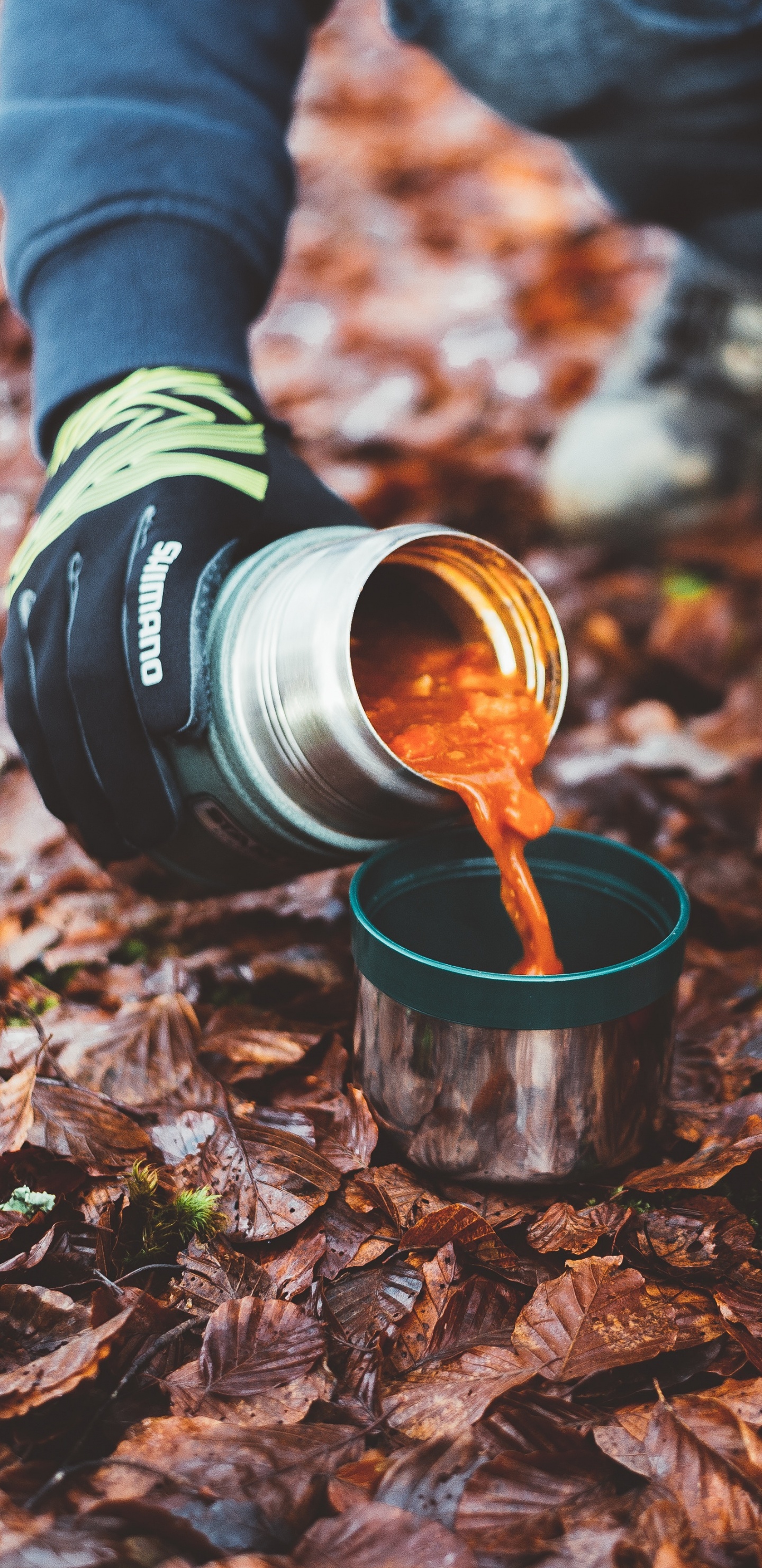 Person Holding Red and Black Camera Lens. Wallpaper in 1440x2960 Resolution