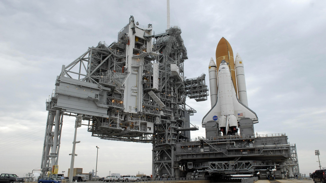 White and Orange Space Ship Under White Clouds During Daytime. Wallpaper in 1280x720 Resolution