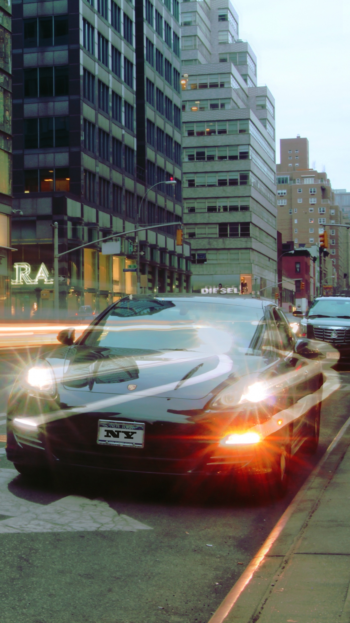 Black Sedan on Road During Daytime. Wallpaper in 1440x2560 Resolution