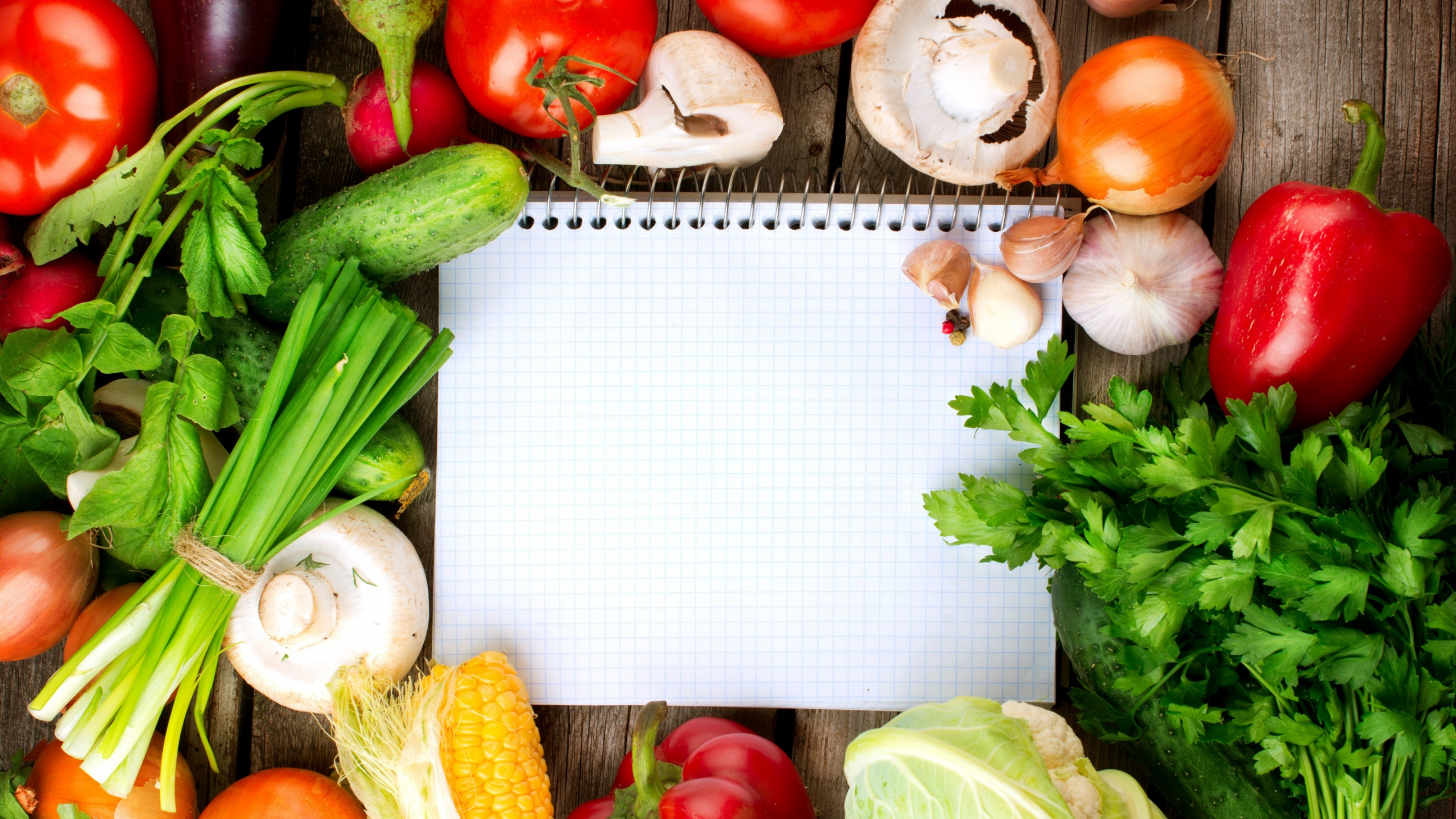 Red Tomato Beside Green Vegetable and Yellow Corn. Wallpaper in 2560x1440 Resolution