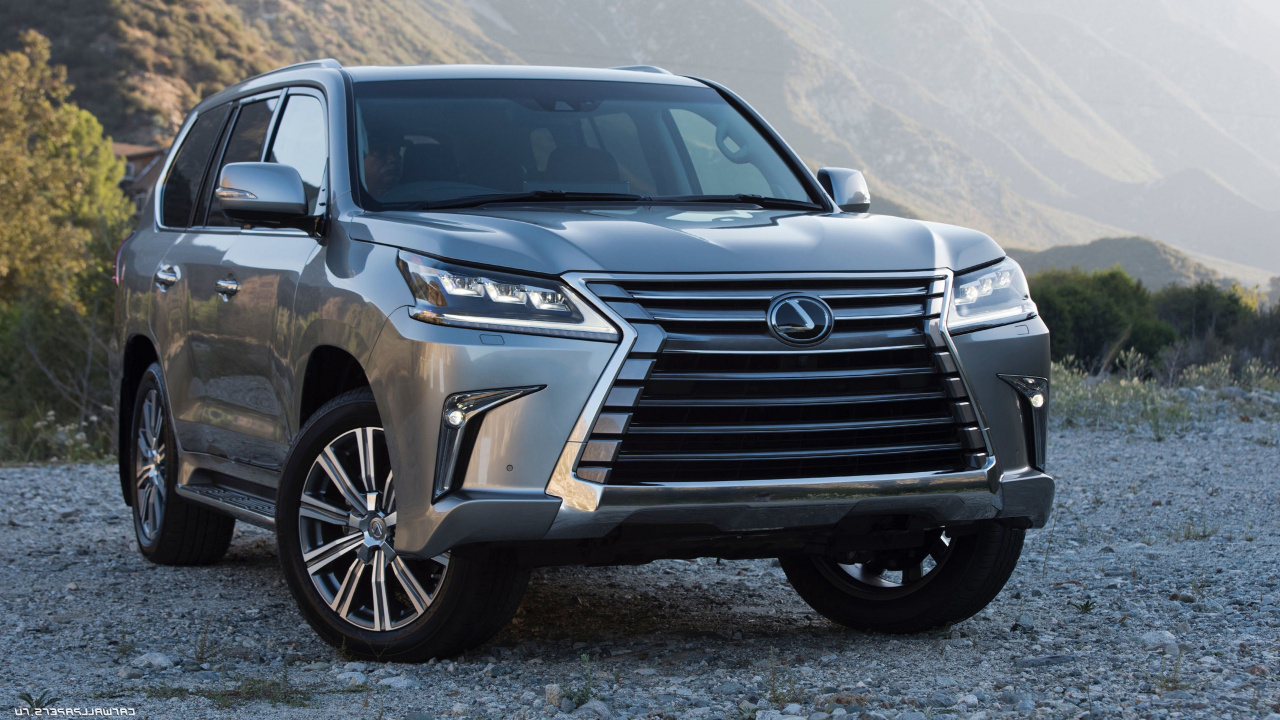 Ford Suv Gris en la Carretera de Asfalto Gris Durante el Día. Wallpaper in 1280x720 Resolution