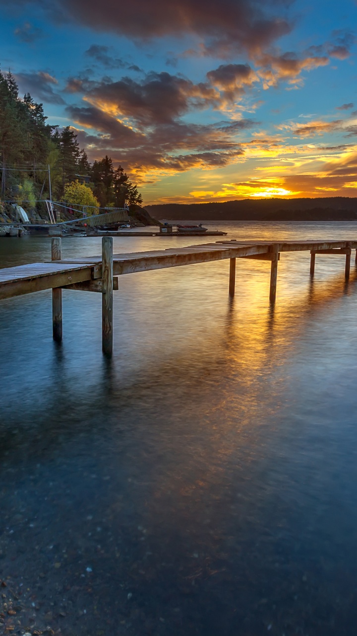 Brown Wooden Dock on Body of Water During Daytime. Wallpaper in 720x1280 Resolution
