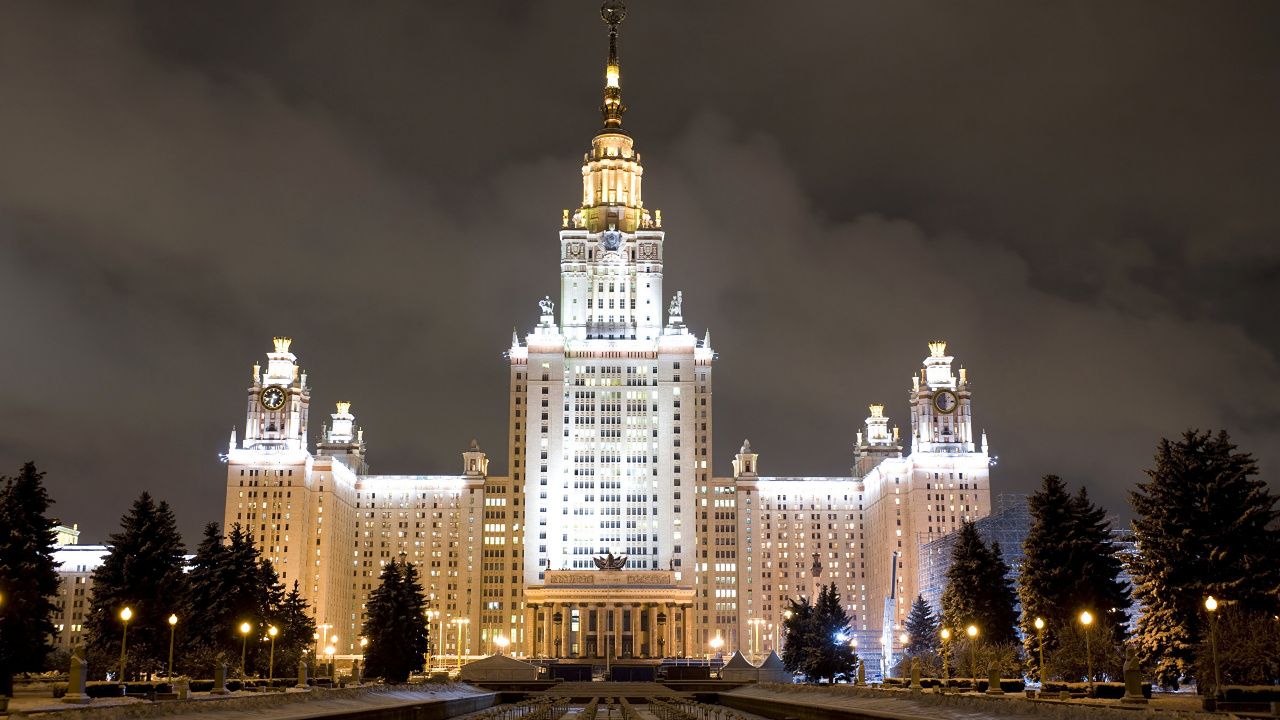 White and Brown Concrete Building During Night Time. Wallpaper in 1280x720 Resolution