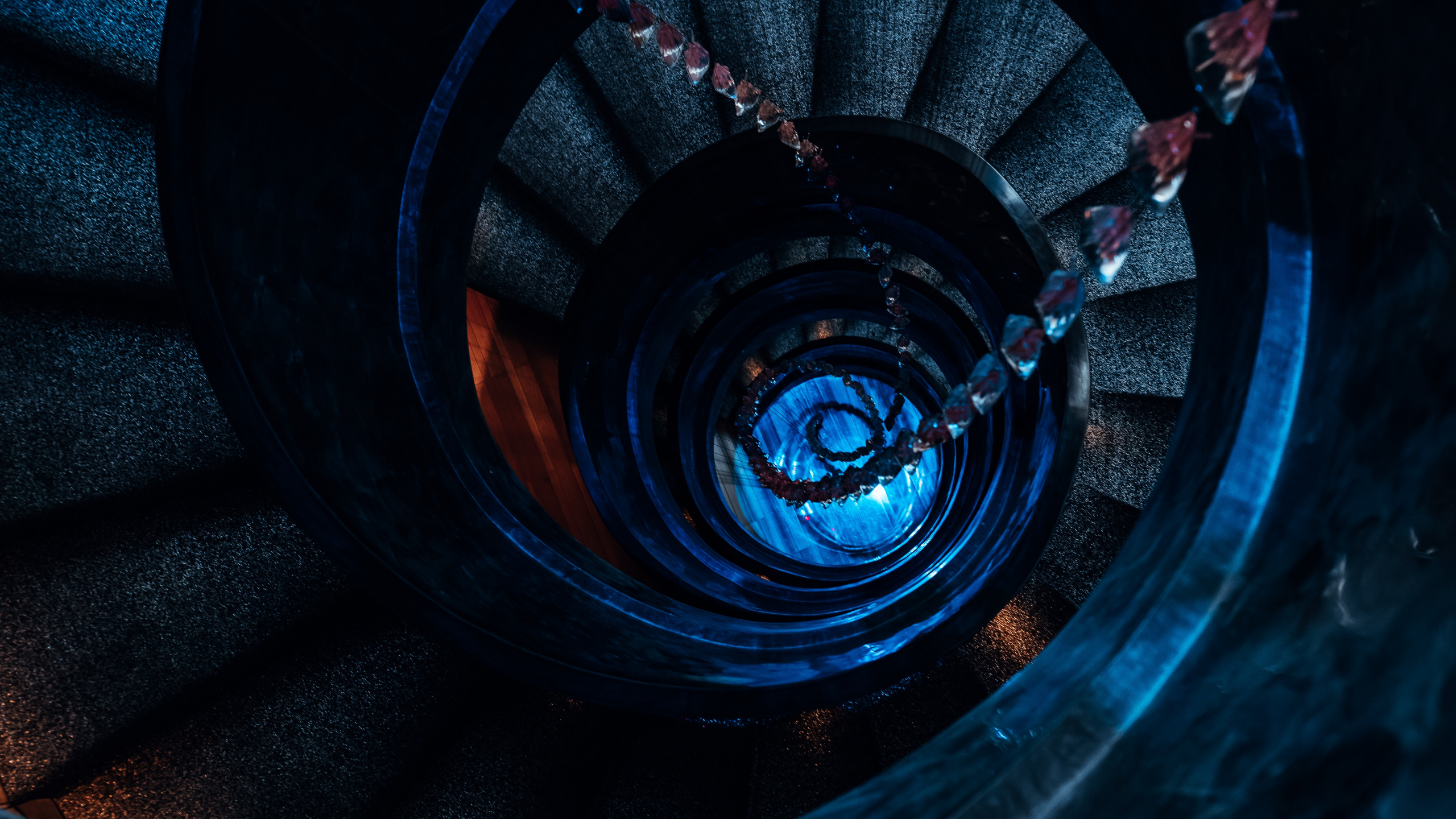 Black Spiral Staircase With Black Metal Railings. Wallpaper in 2560x1440 Resolution