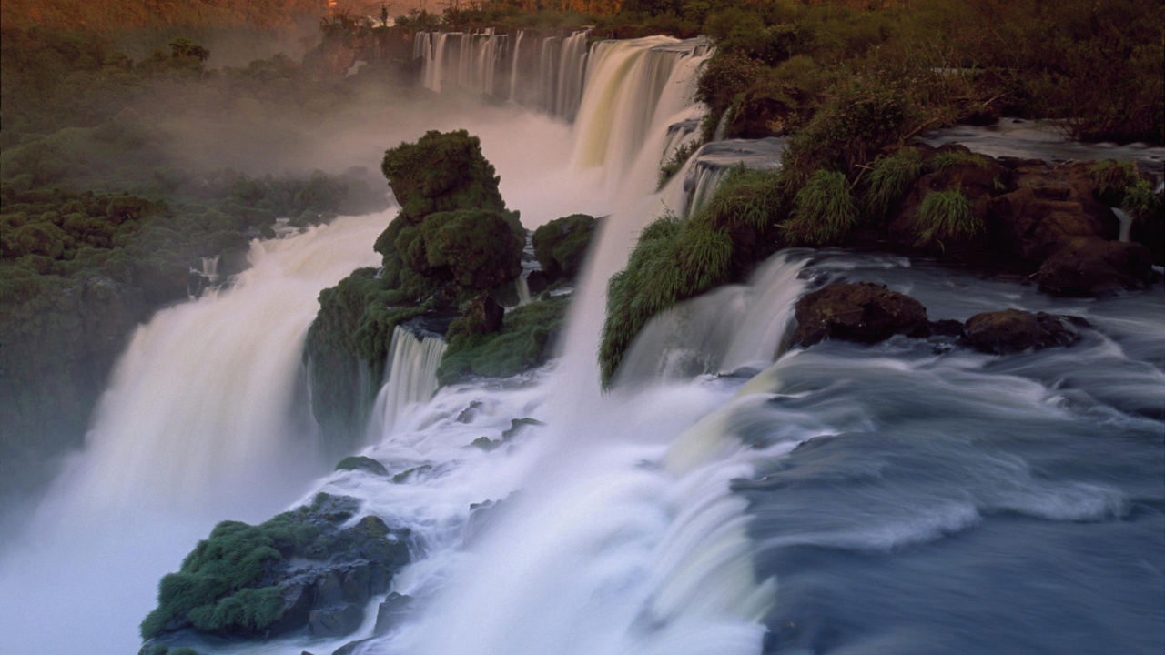 Waterfalls in The Middle of Forest During Sunset. Wallpaper in 1280x720 Resolution
